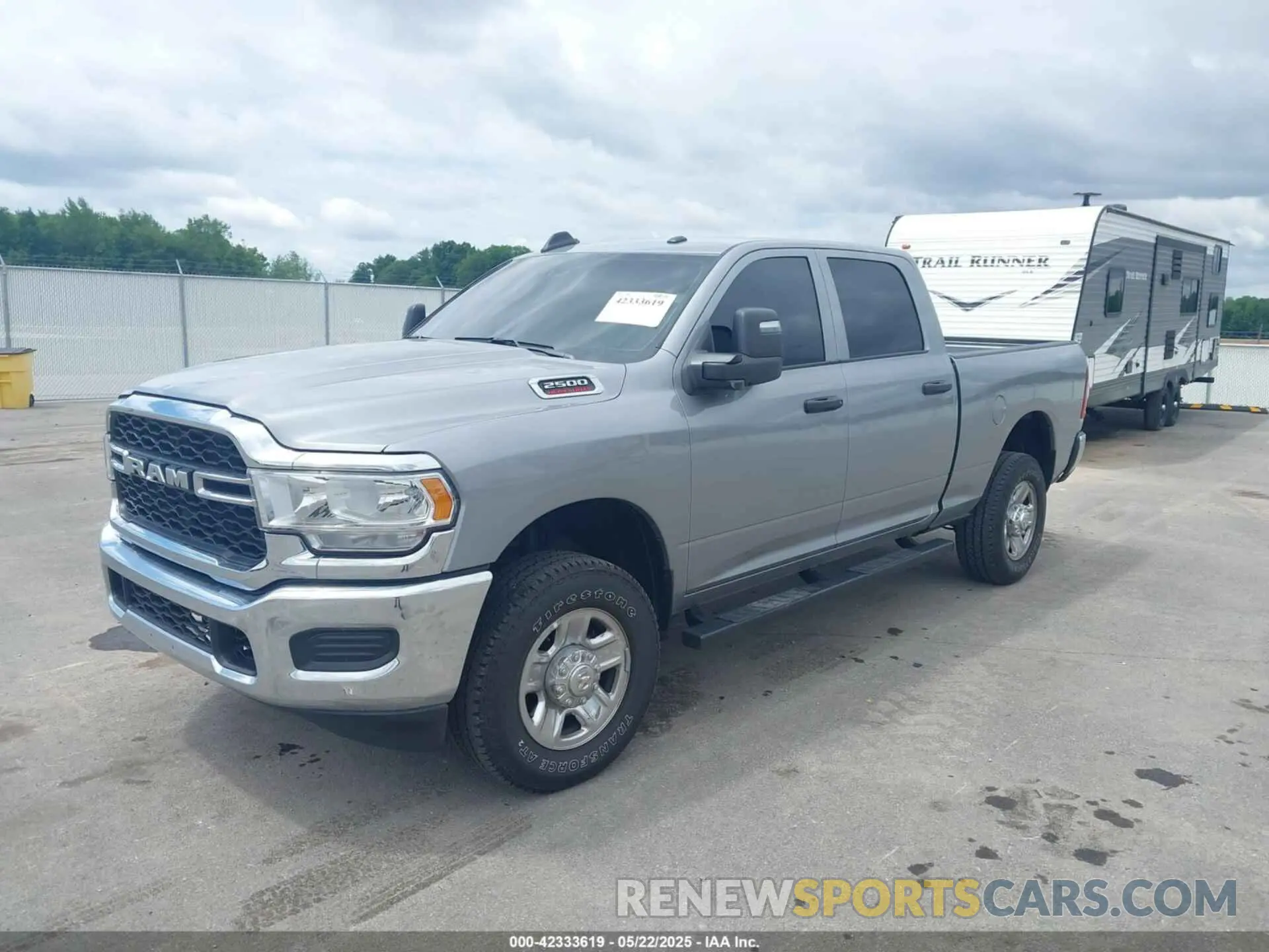 2 Photograph of a damaged car 3C6UR5CJ3RG266850 RAM 2500 2024