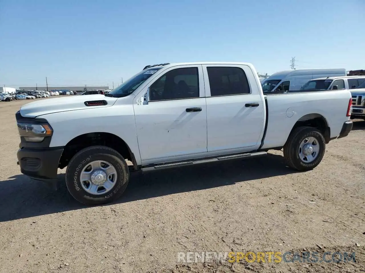 1 Photograph of a damaged car 3C6UR5CJ4RG228480 RAM 2500 2024