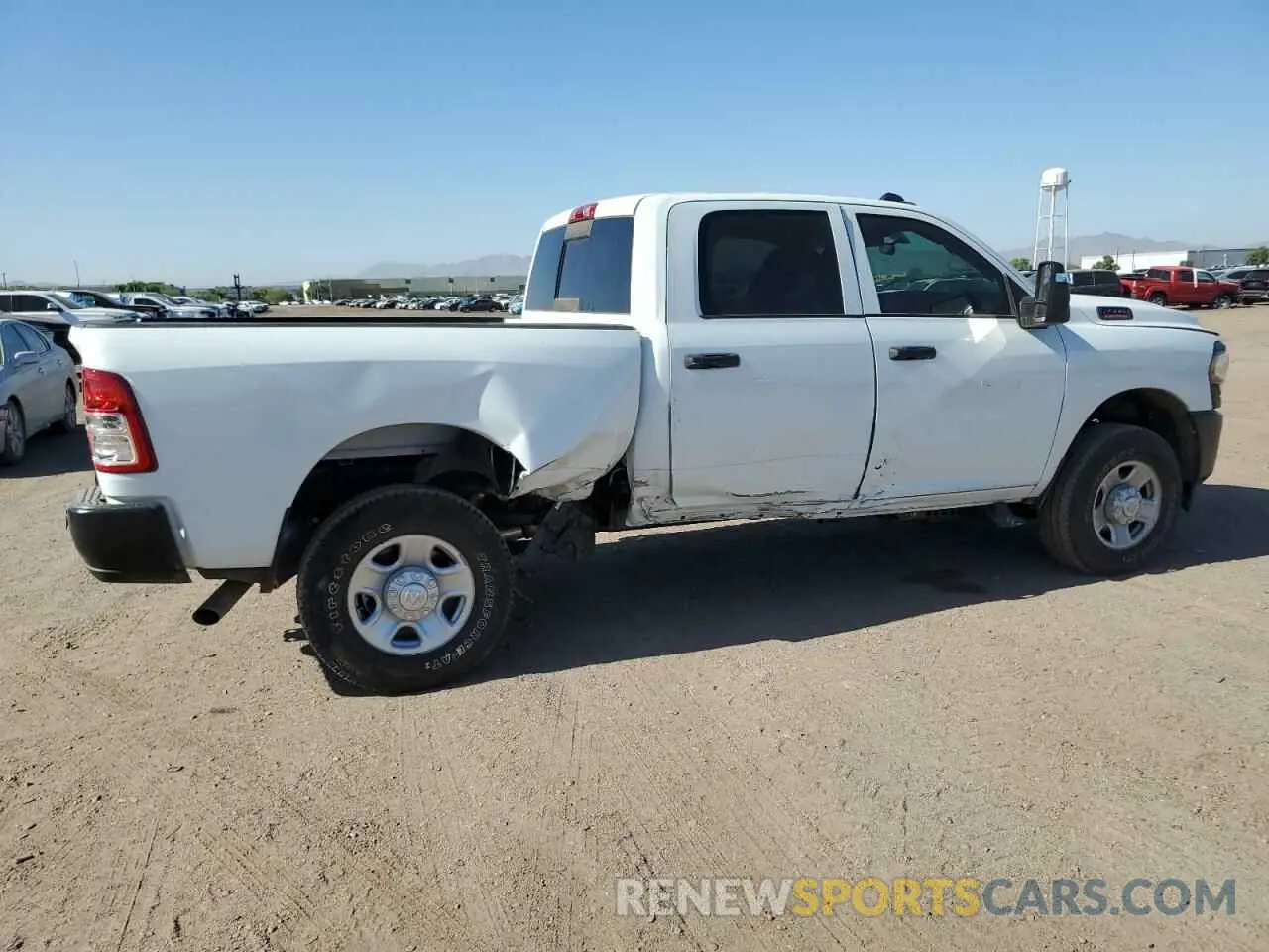 3 Photograph of a damaged car 3C6UR5CJ4RG228480 RAM 2500 2024