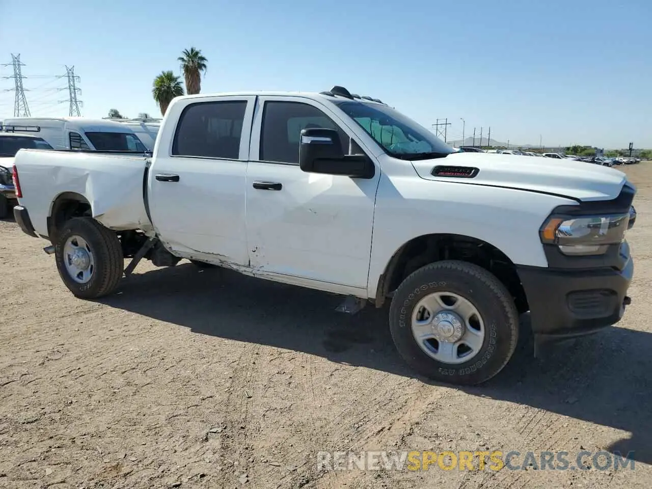 4 Photograph of a damaged car 3C6UR5CJ4RG228480 RAM 2500 2024