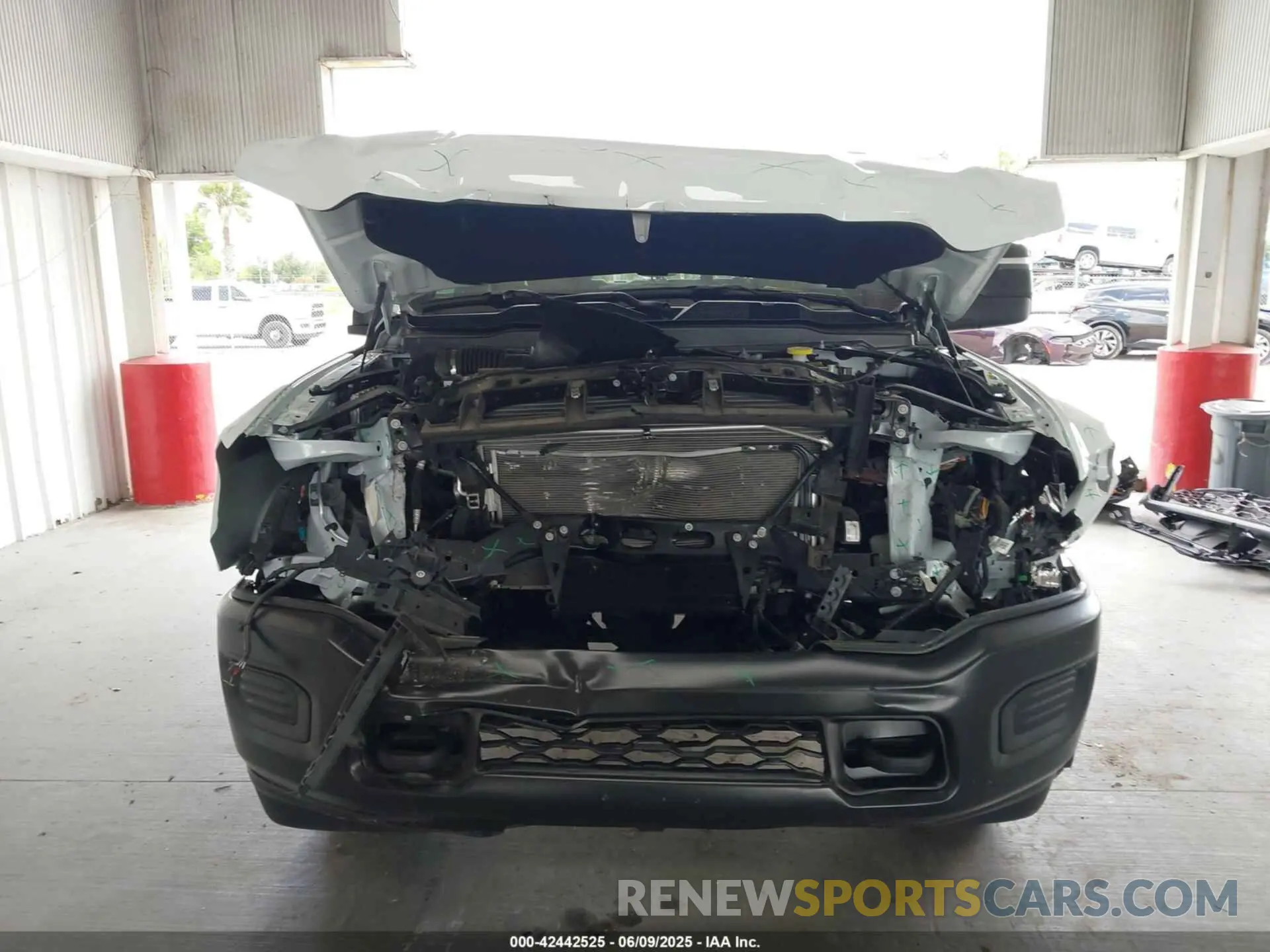 13 Photograph of a damaged car 3C6UR5CJ4RG267621 RAM 2500 2024
