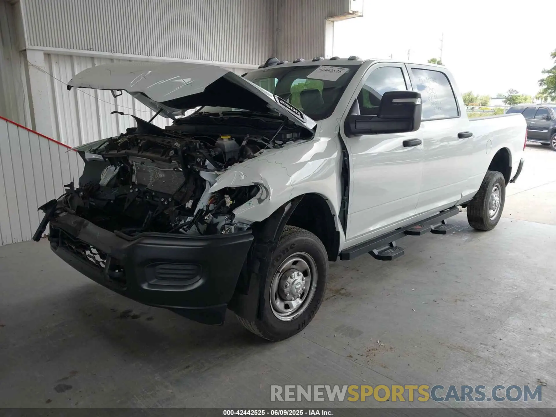 2 Photograph of a damaged car 3C6UR5CJ4RG267621 RAM 2500 2024