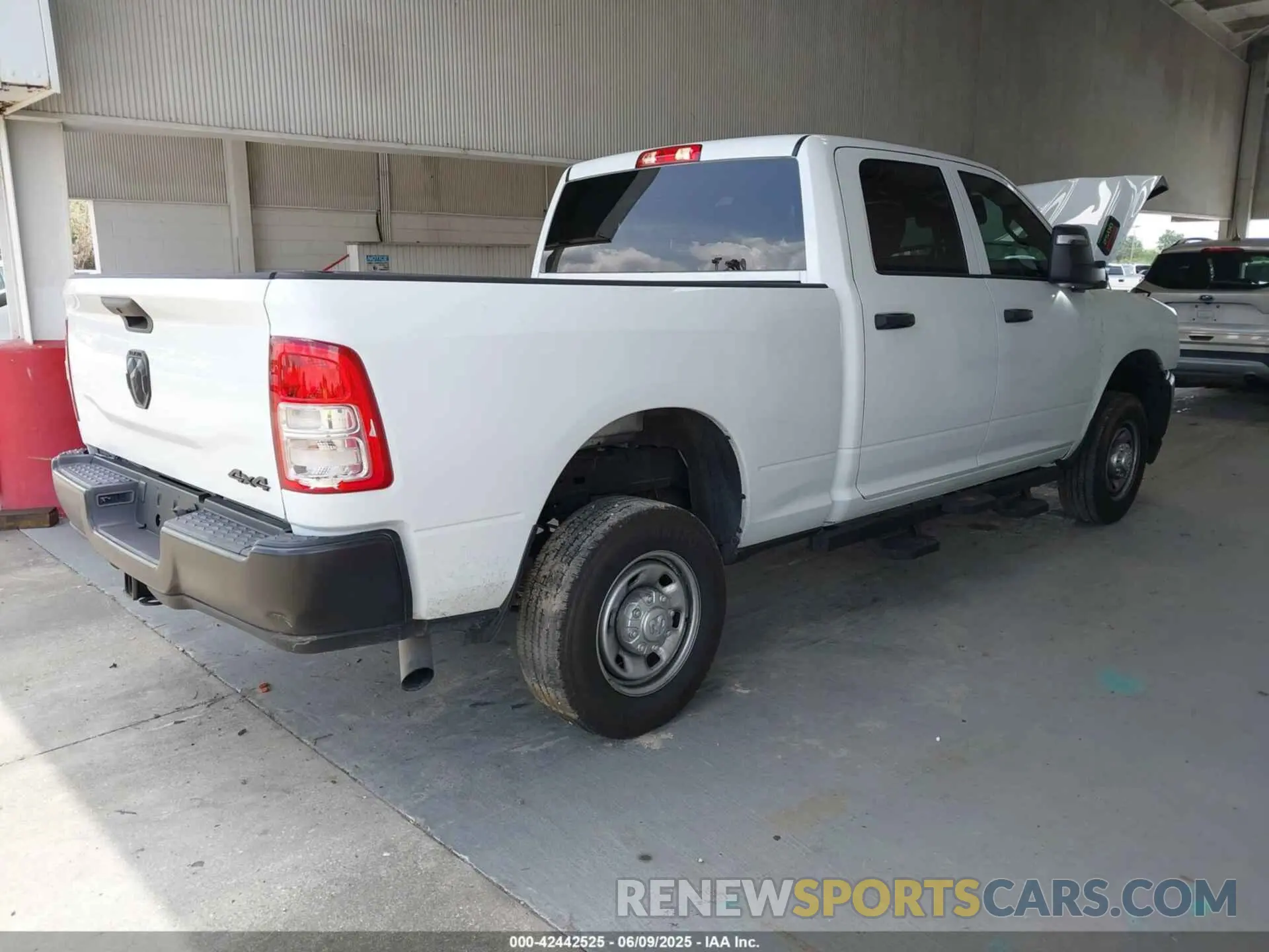 4 Photograph of a damaged car 3C6UR5CJ4RG267621 RAM 2500 2024