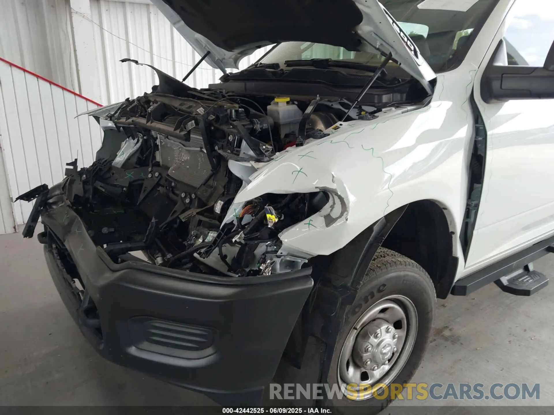 6 Photograph of a damaged car 3C6UR5CJ4RG267621 RAM 2500 2024