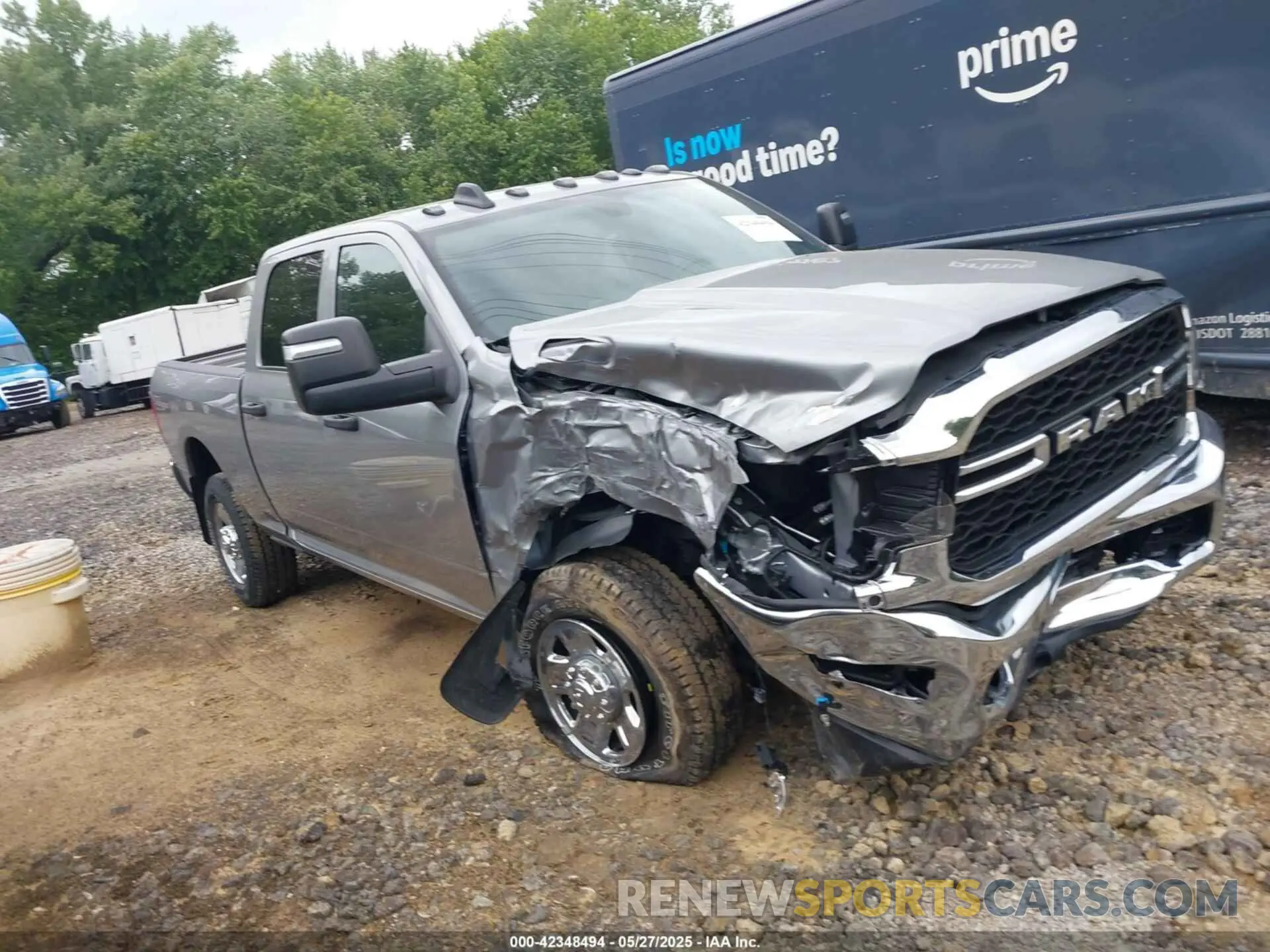 1 Photograph of a damaged car 3C6UR5CJ6RG252974 RAM 2500 2024