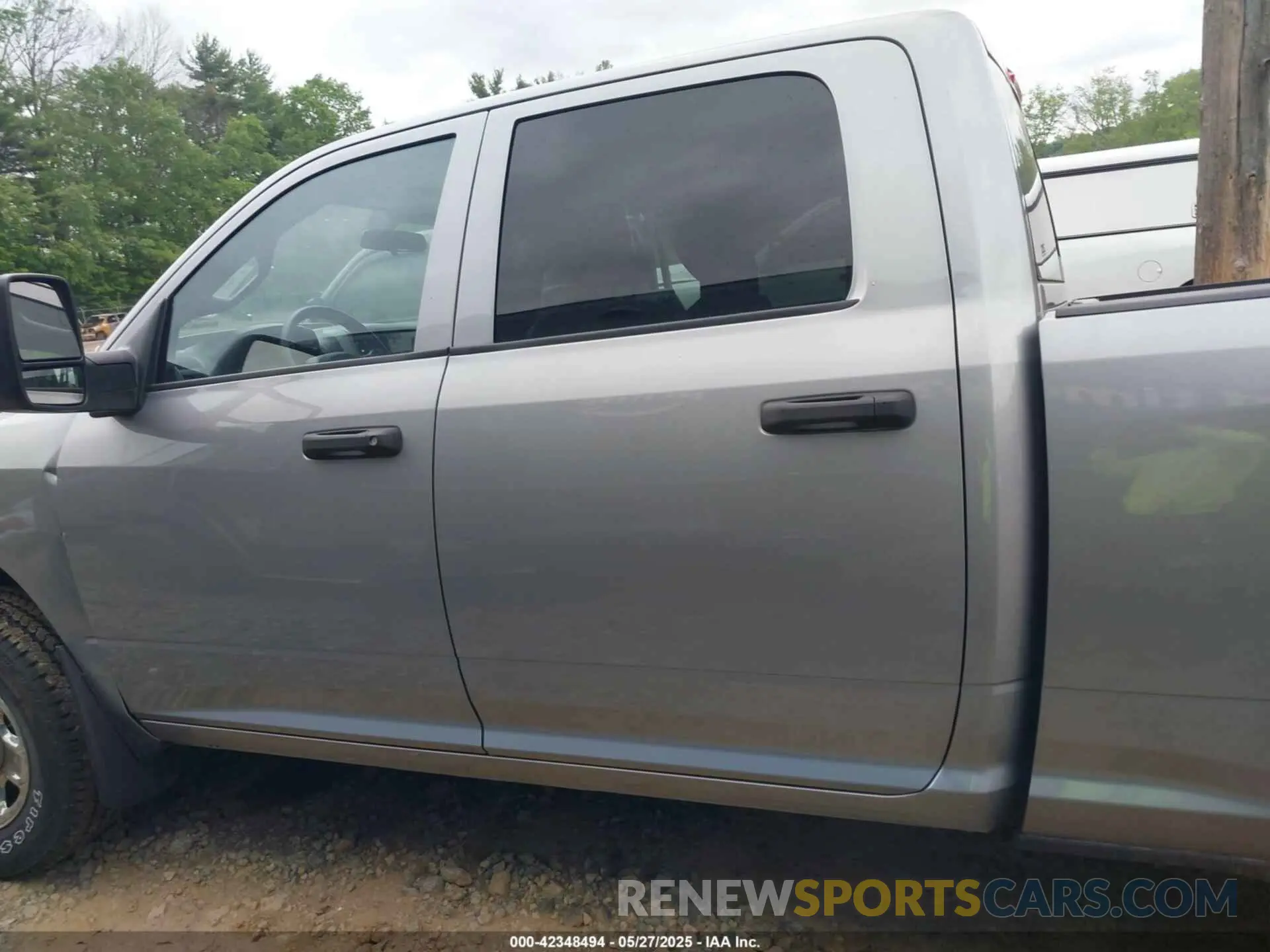 14 Photograph of a damaged car 3C6UR5CJ6RG252974 RAM 2500 2024