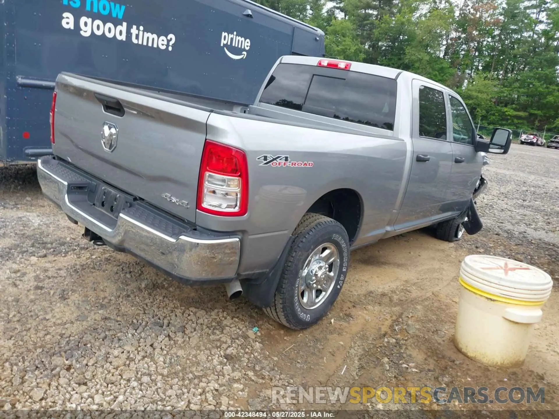 4 Photograph of a damaged car 3C6UR5CJ6RG252974 RAM 2500 2024