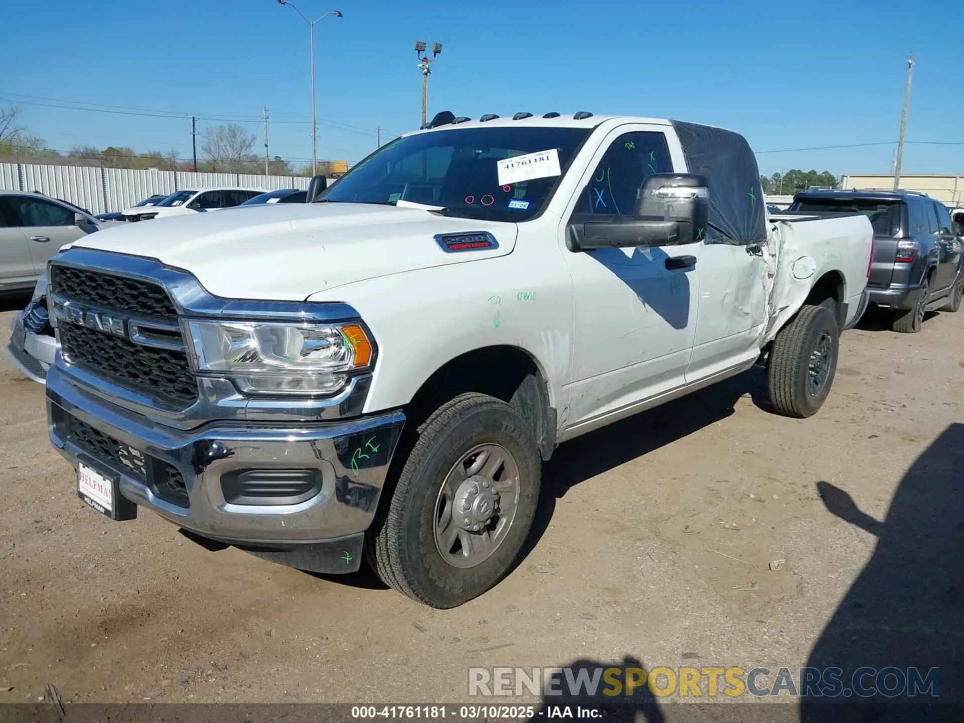 2 Photograph of a damaged car 3C6UR5CJ7RG264311 RAM 2500 2024