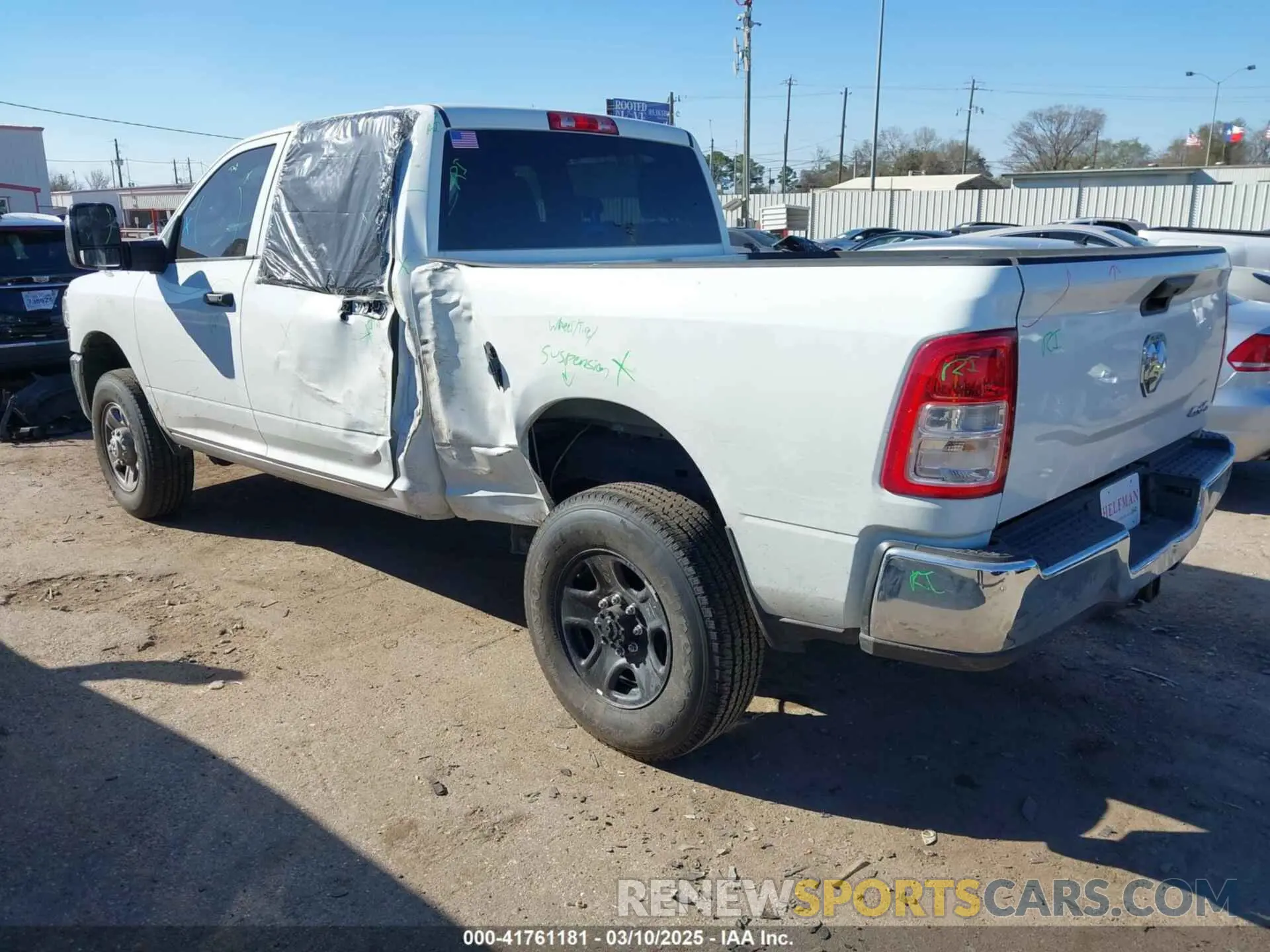 3 Photograph of a damaged car 3C6UR5CJ7RG264311 RAM 2500 2024