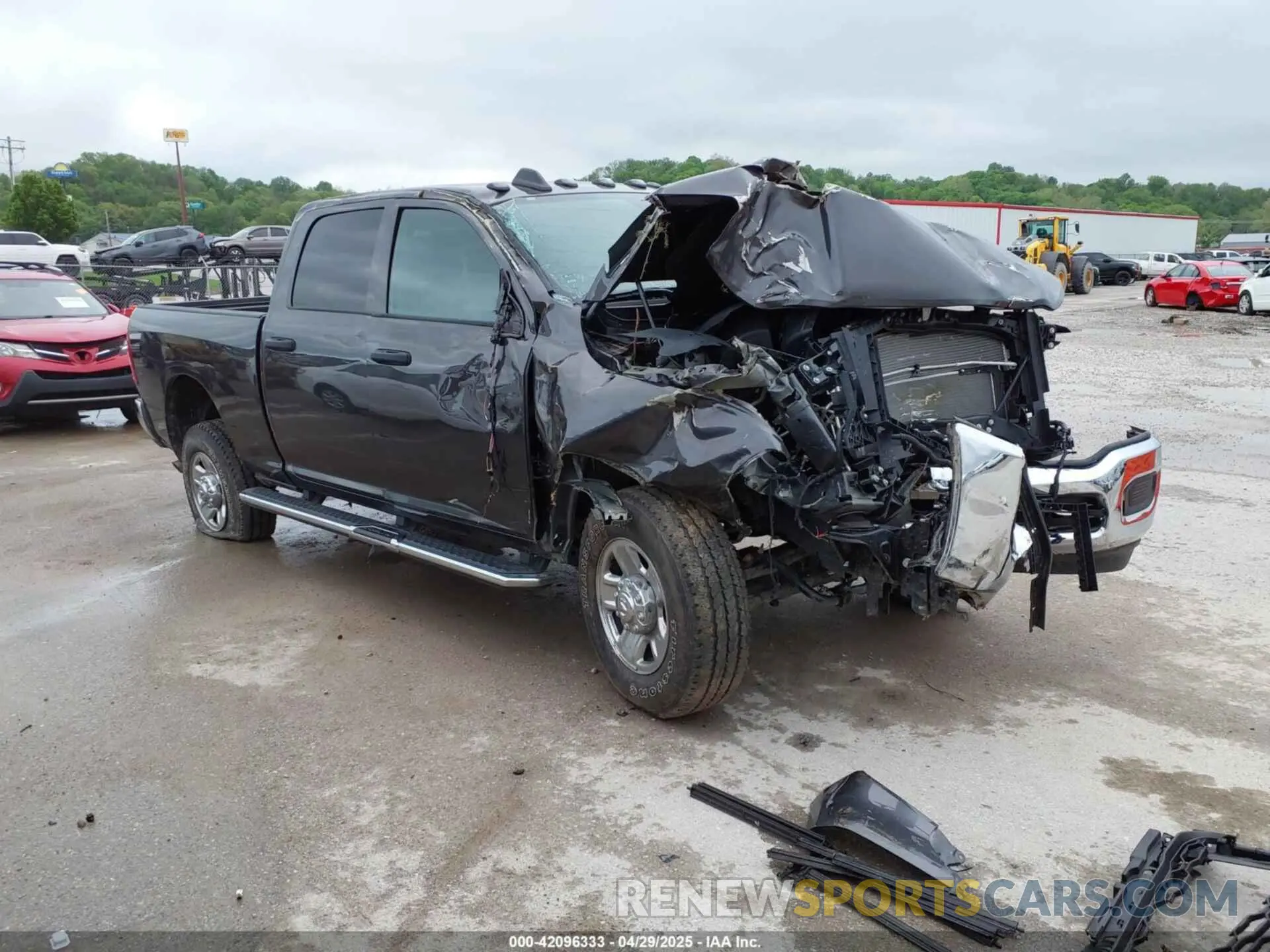 1 Photograph of a damaged car 3C6UR5CJ8RG181826 RAM 2500 2024