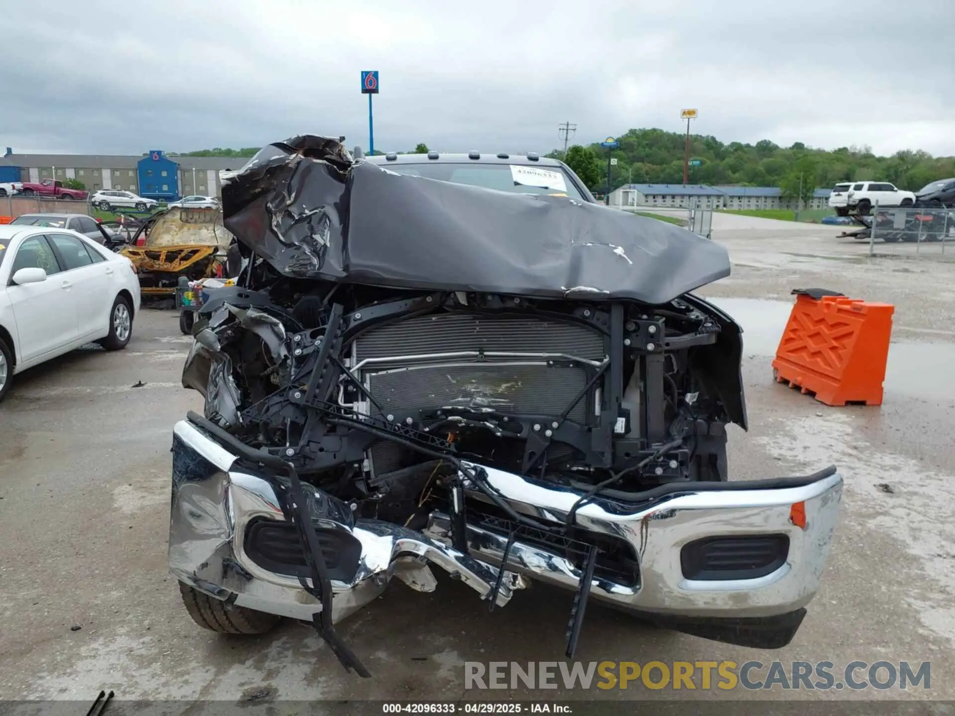 13 Photograph of a damaged car 3C6UR5CJ8RG181826 RAM 2500 2024