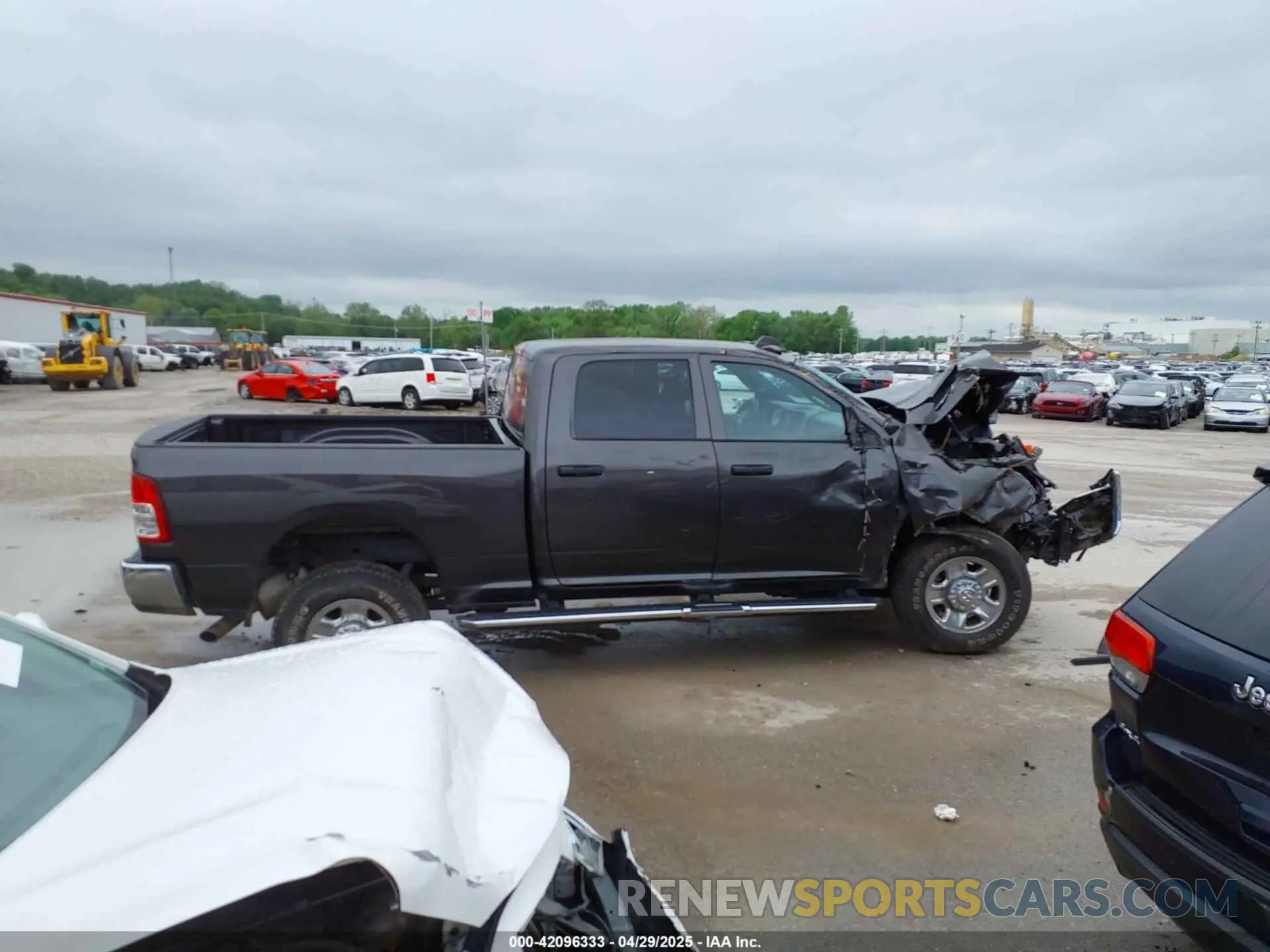 14 Photograph of a damaged car 3C6UR5CJ8RG181826 RAM 2500 2024