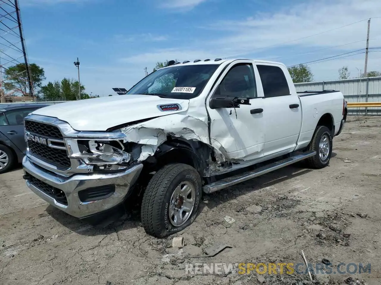 1 Photograph of a damaged car 3C6UR5CJXRG315185 RAM 2500 2024