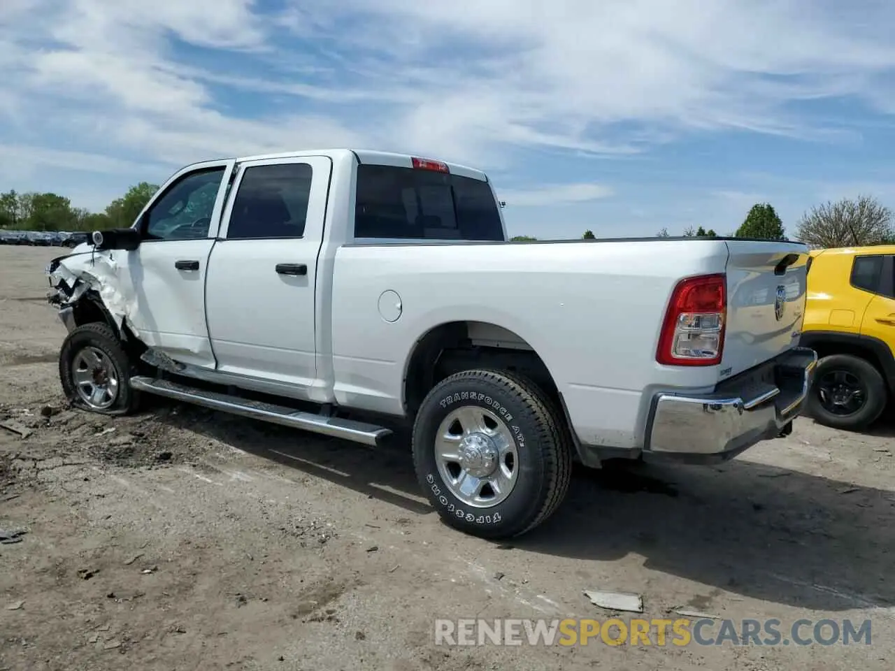 2 Photograph of a damaged car 3C6UR5CJXRG315185 RAM 2500 2024
