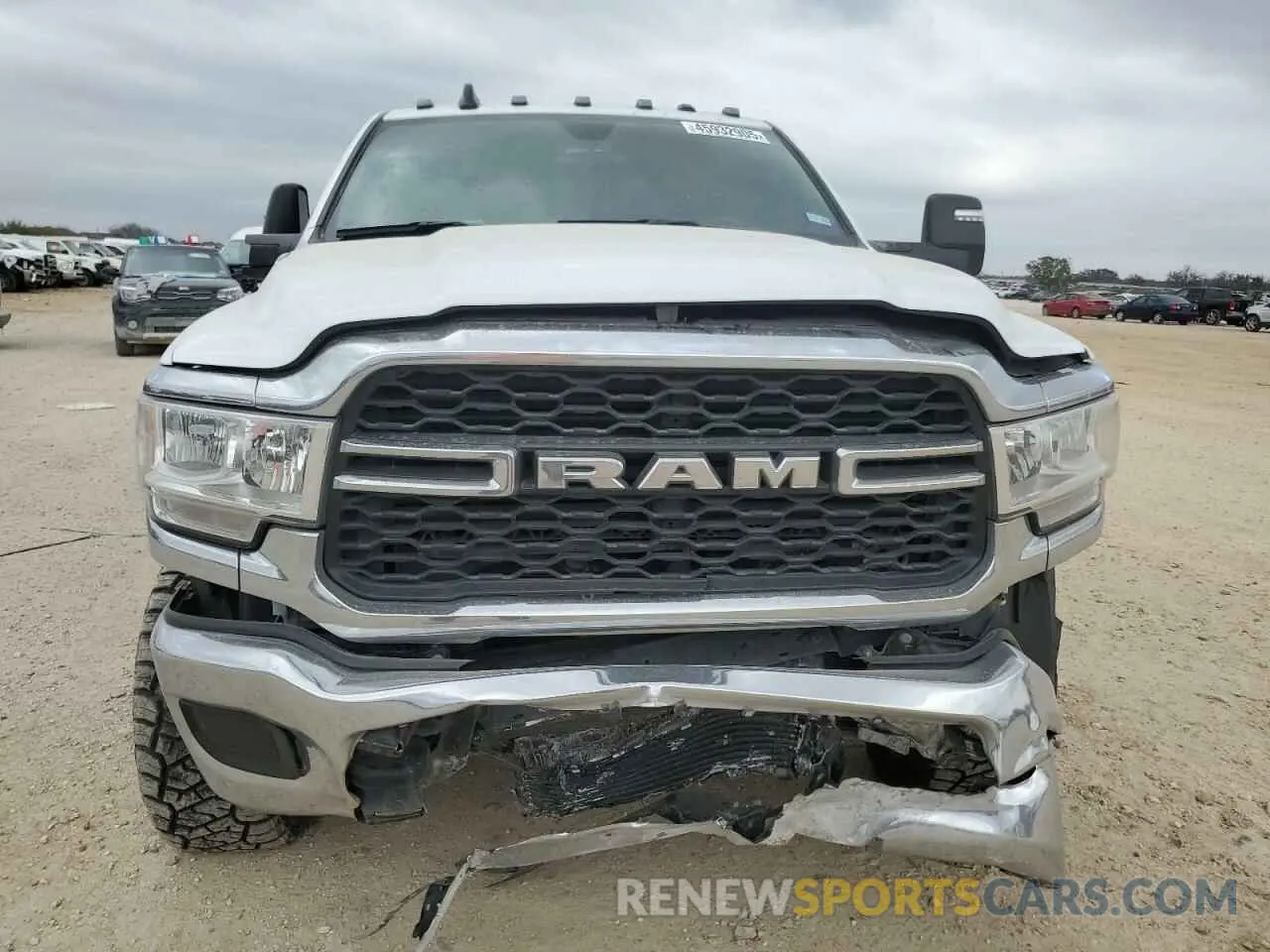 5 Photograph of a damaged car 3C6UR5CL0RG117345 RAM 2500 2024