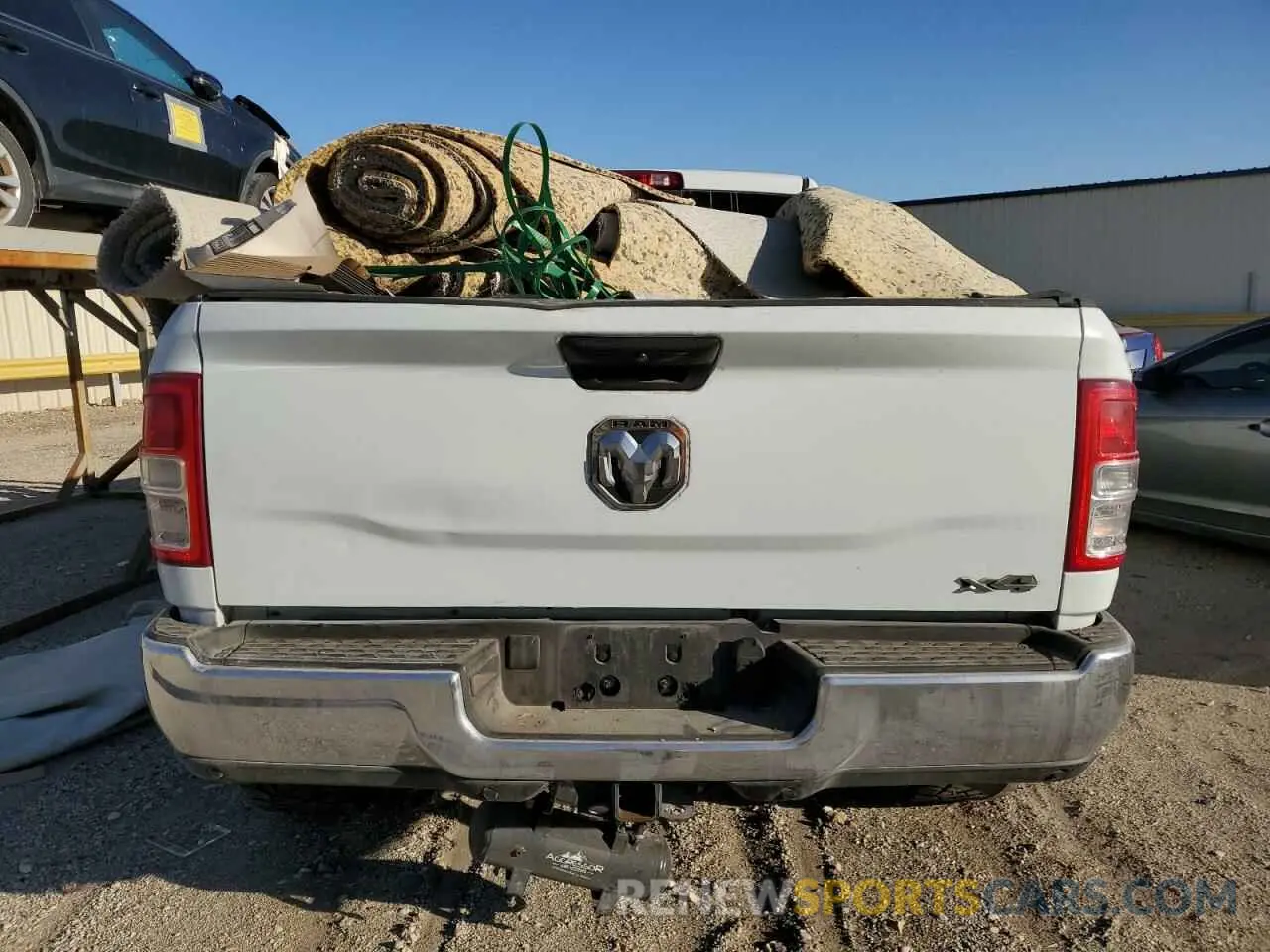 6 Photograph of a damaged car 3C6UR5CL0RG117345 RAM 2500 2024