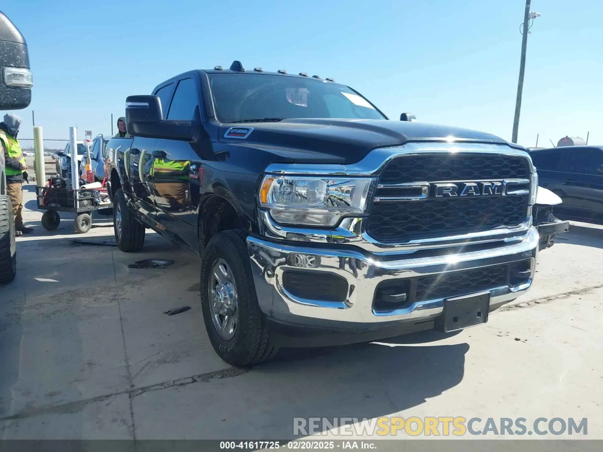 1 Photograph of a damaged car 3C6UR5CL0RG264829 RAM 2500 2024
