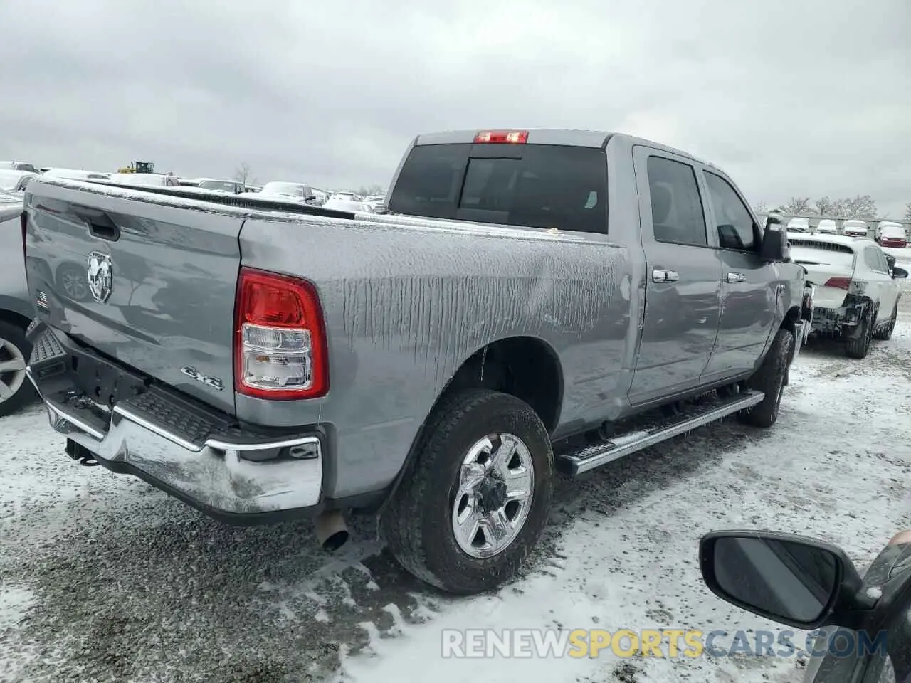 3 Photograph of a damaged car 3C6UR5CL1RG221519 RAM 2500 2024