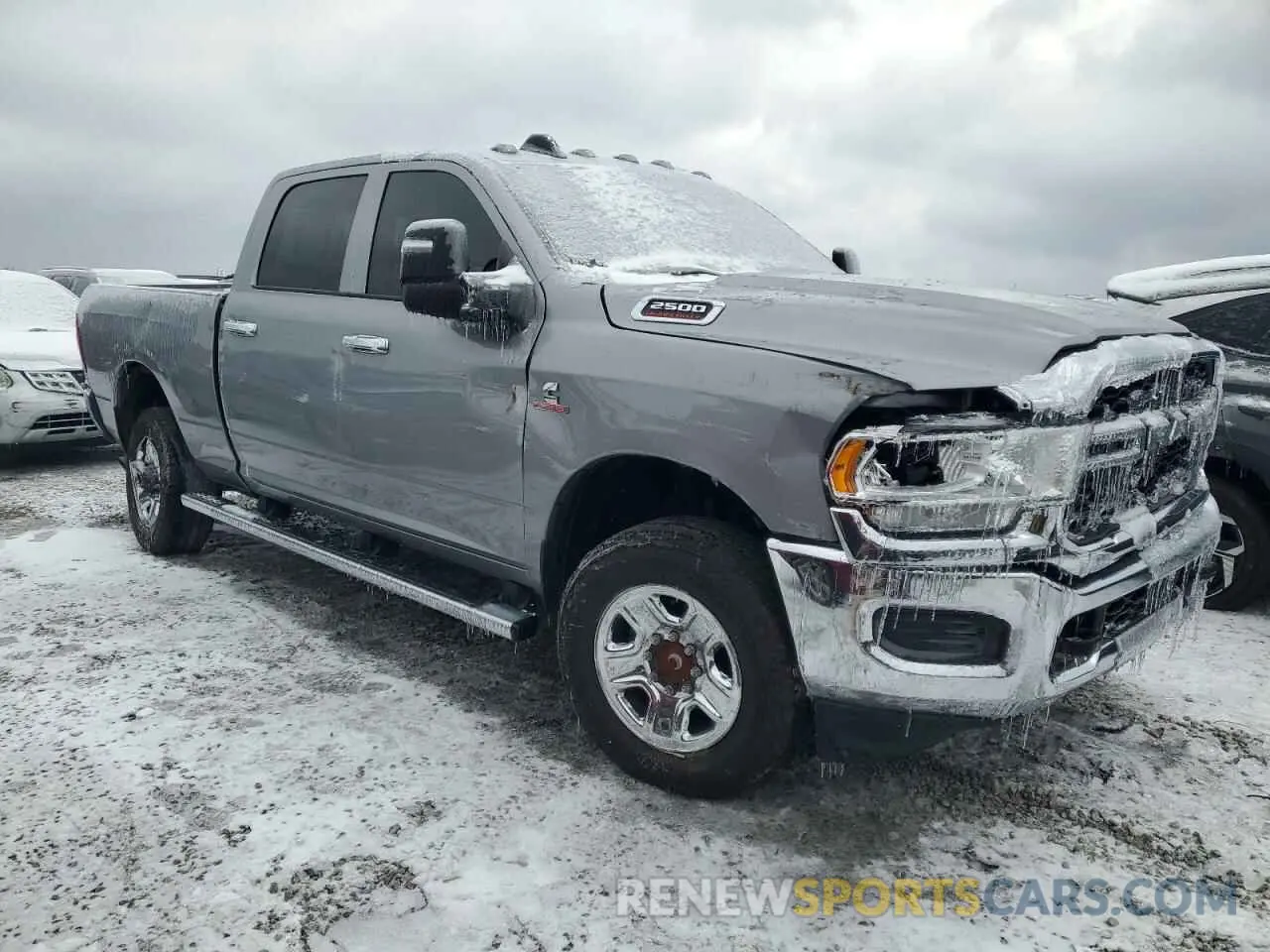 4 Photograph of a damaged car 3C6UR5CL1RG221519 RAM 2500 2024