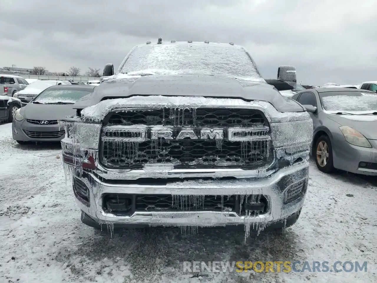 5 Photograph of a damaged car 3C6UR5CL1RG221519 RAM 2500 2024