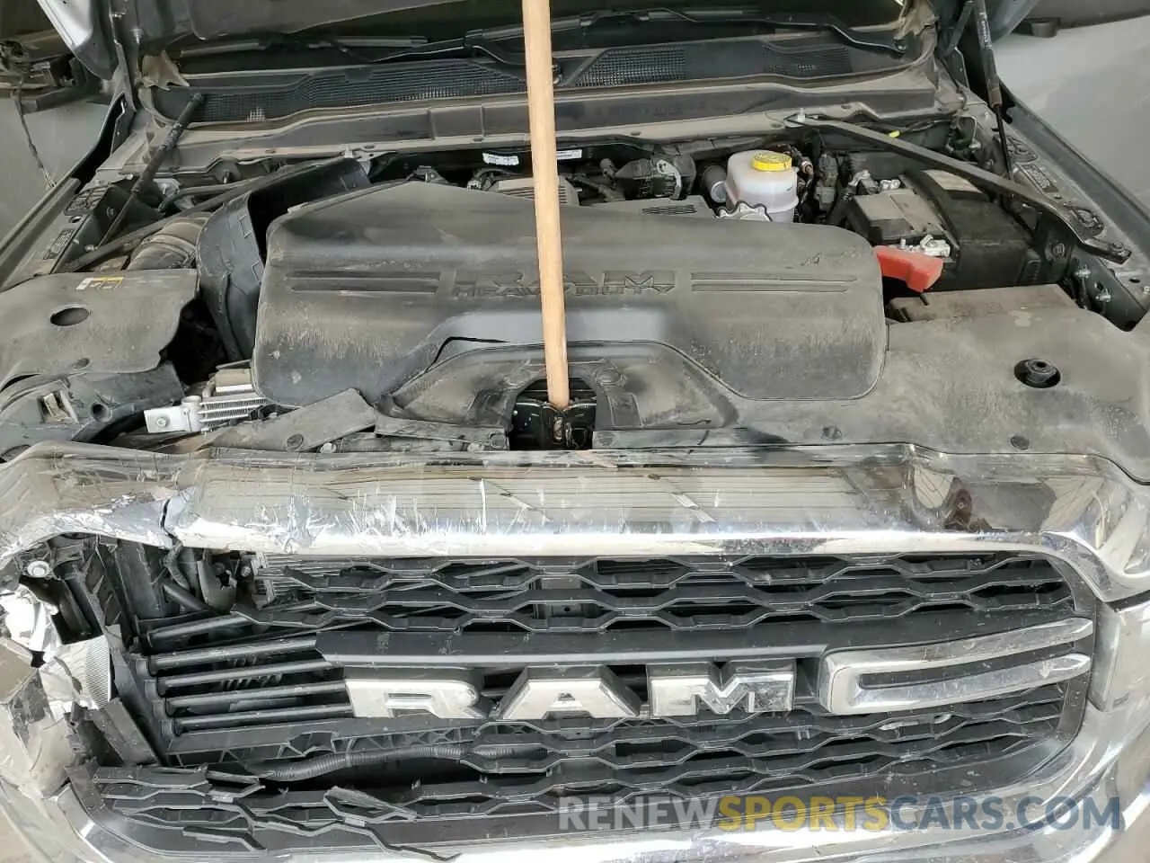 11 Photograph of a damaged car 3C6UR5CL1RG328893 RAM 2500 2024