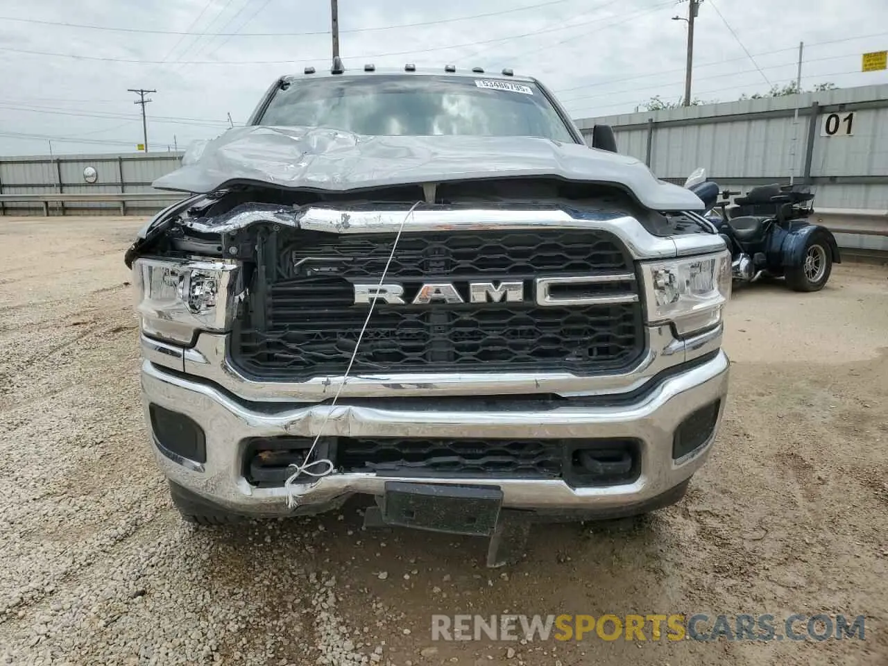 5 Photograph of a damaged car 3C6UR5CL1RG328893 RAM 2500 2024