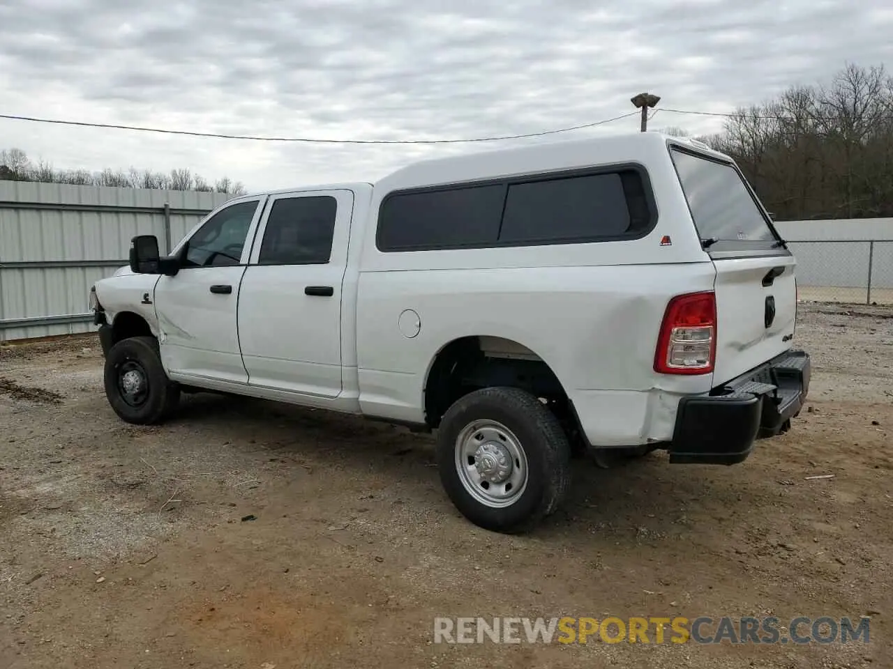 2 Photograph of a damaged car 3C6UR5CL2RG368092 RAM 2500 2024