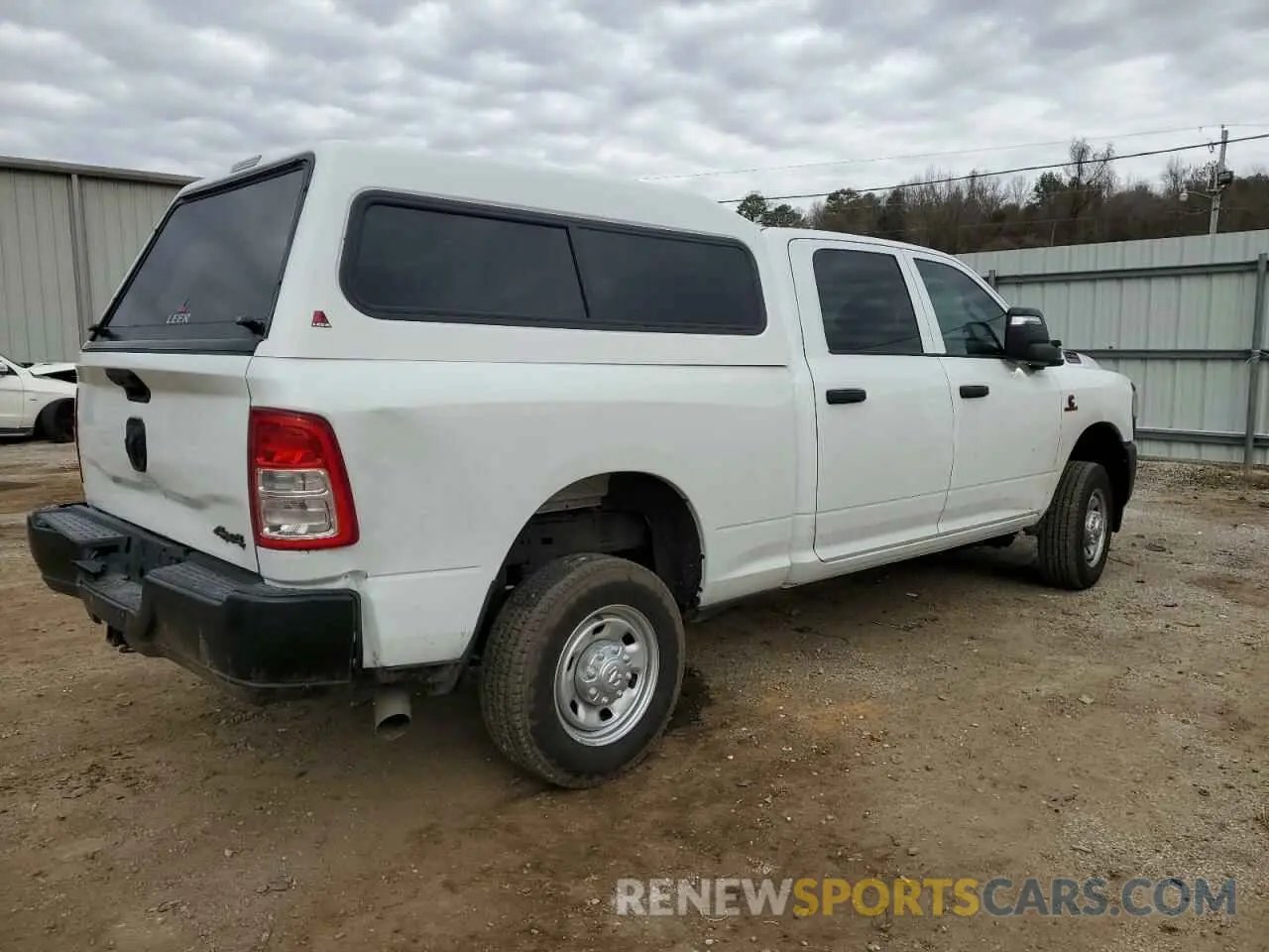3 Photograph of a damaged car 3C6UR5CL2RG368092 RAM 2500 2024
