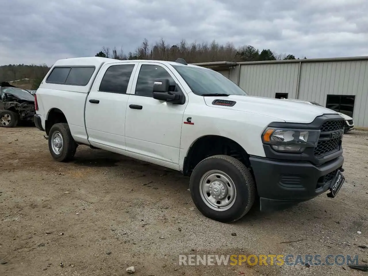 4 Photograph of a damaged car 3C6UR5CL2RG368092 RAM 2500 2024
