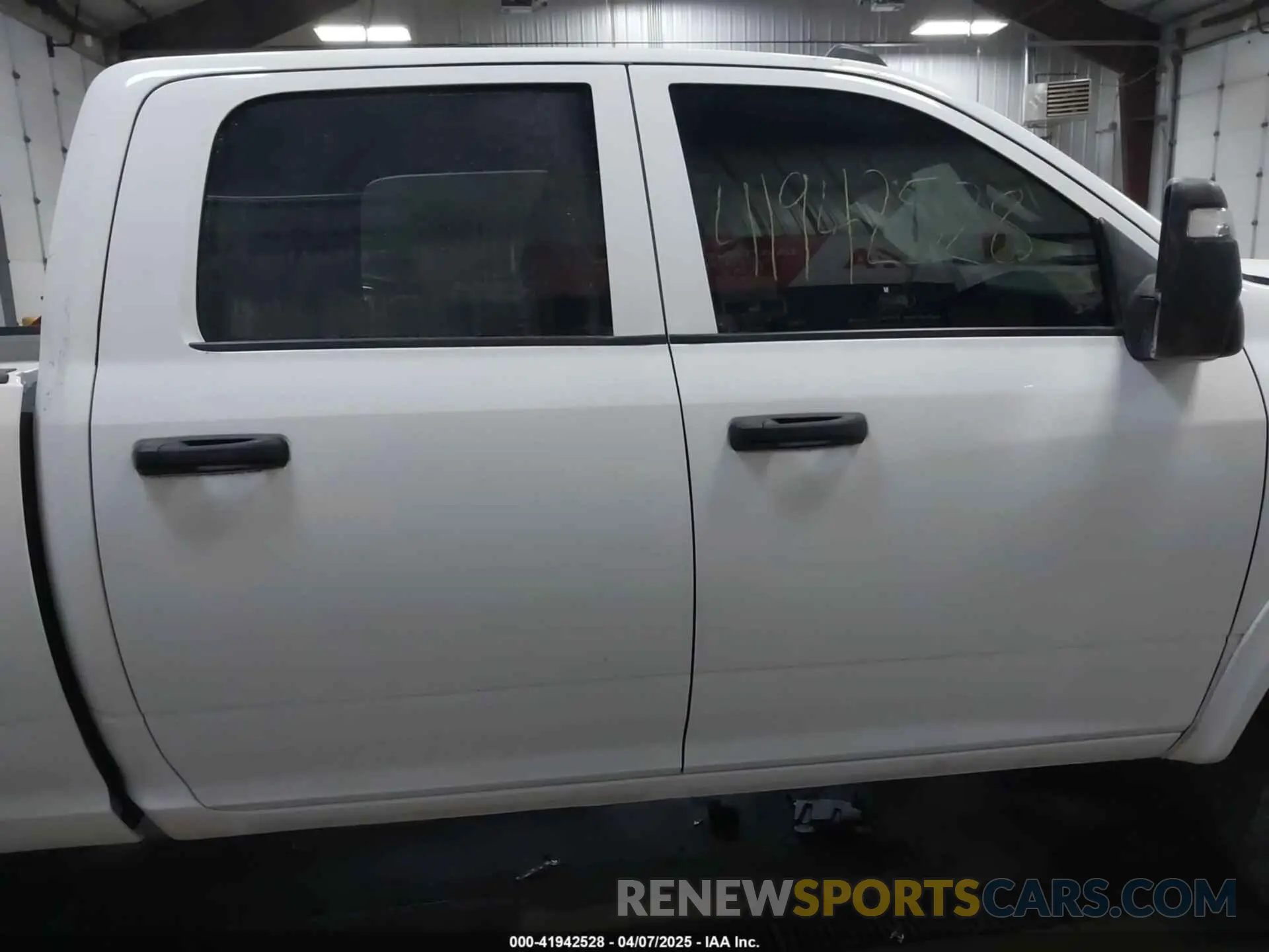 13 Photograph of a damaged car 3C6UR5CL3RG102516 RAM 2500 2024