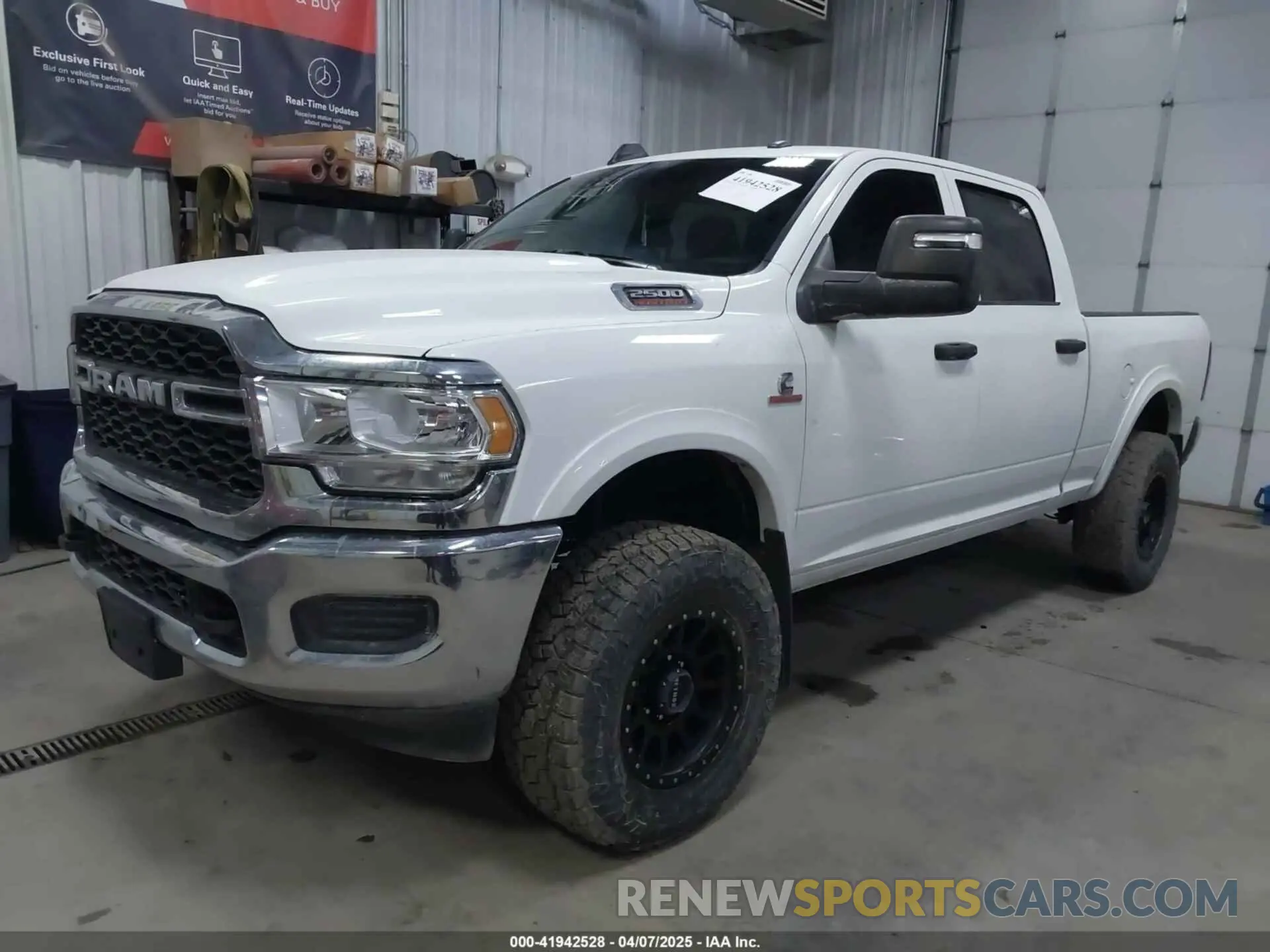 2 Photograph of a damaged car 3C6UR5CL3RG102516 RAM 2500 2024
