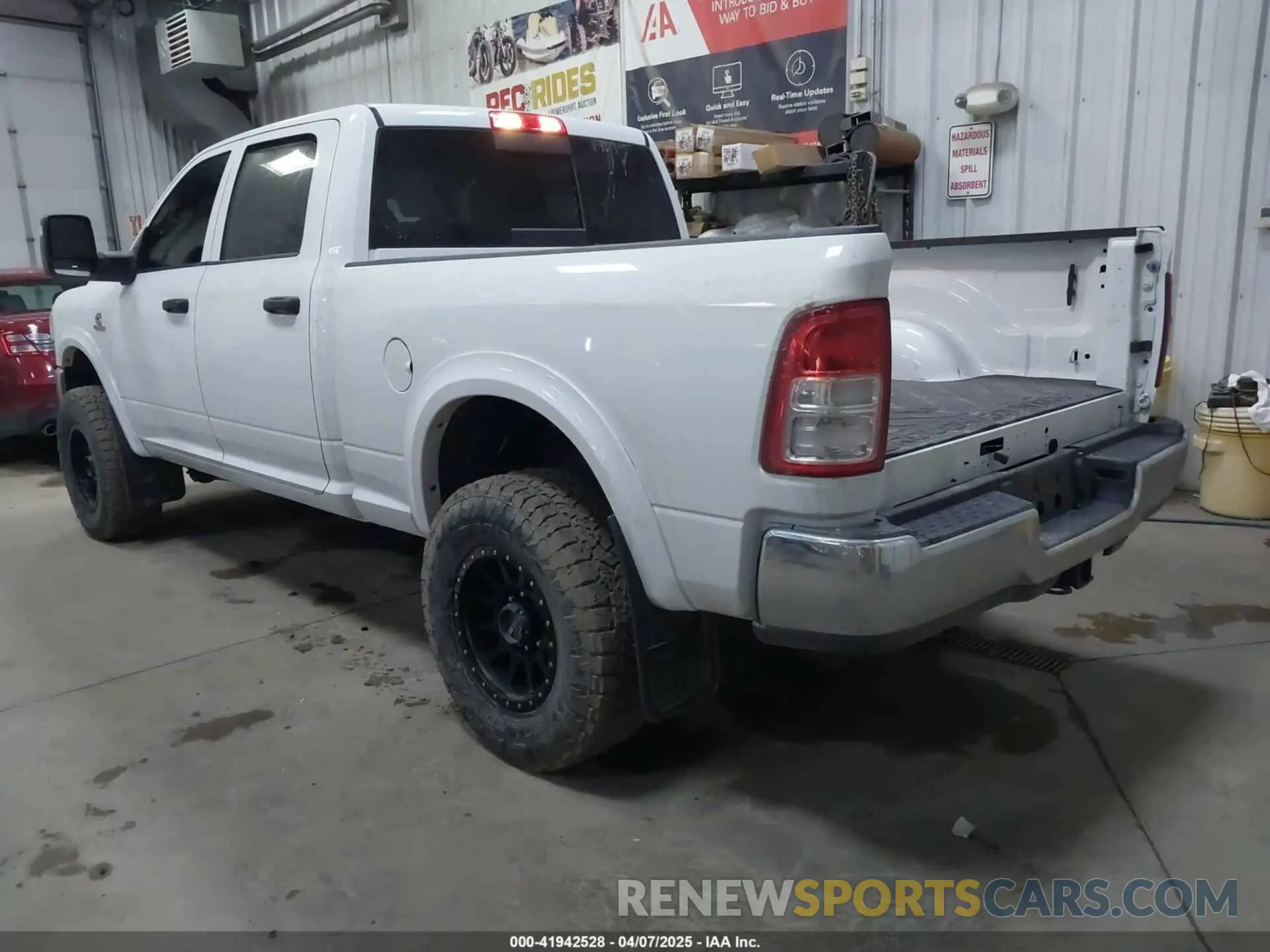 3 Photograph of a damaged car 3C6UR5CL3RG102516 RAM 2500 2024