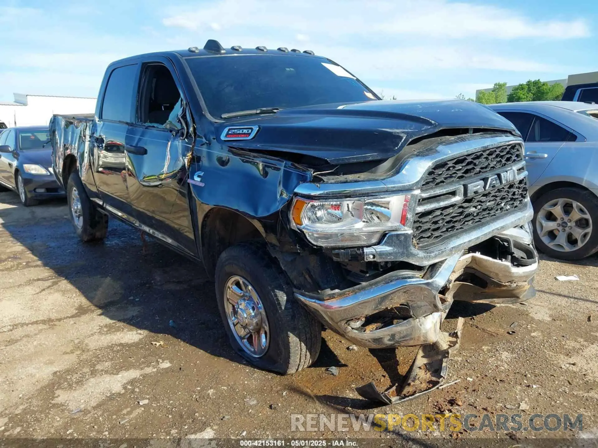 1 Photograph of a damaged car 3C6UR5CL3RG221120 RAM 2500 2024