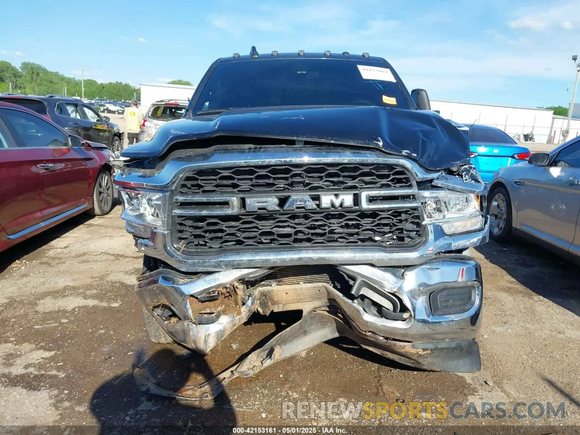 13 Photograph of a damaged car 3C6UR5CL3RG221120 RAM 2500 2024