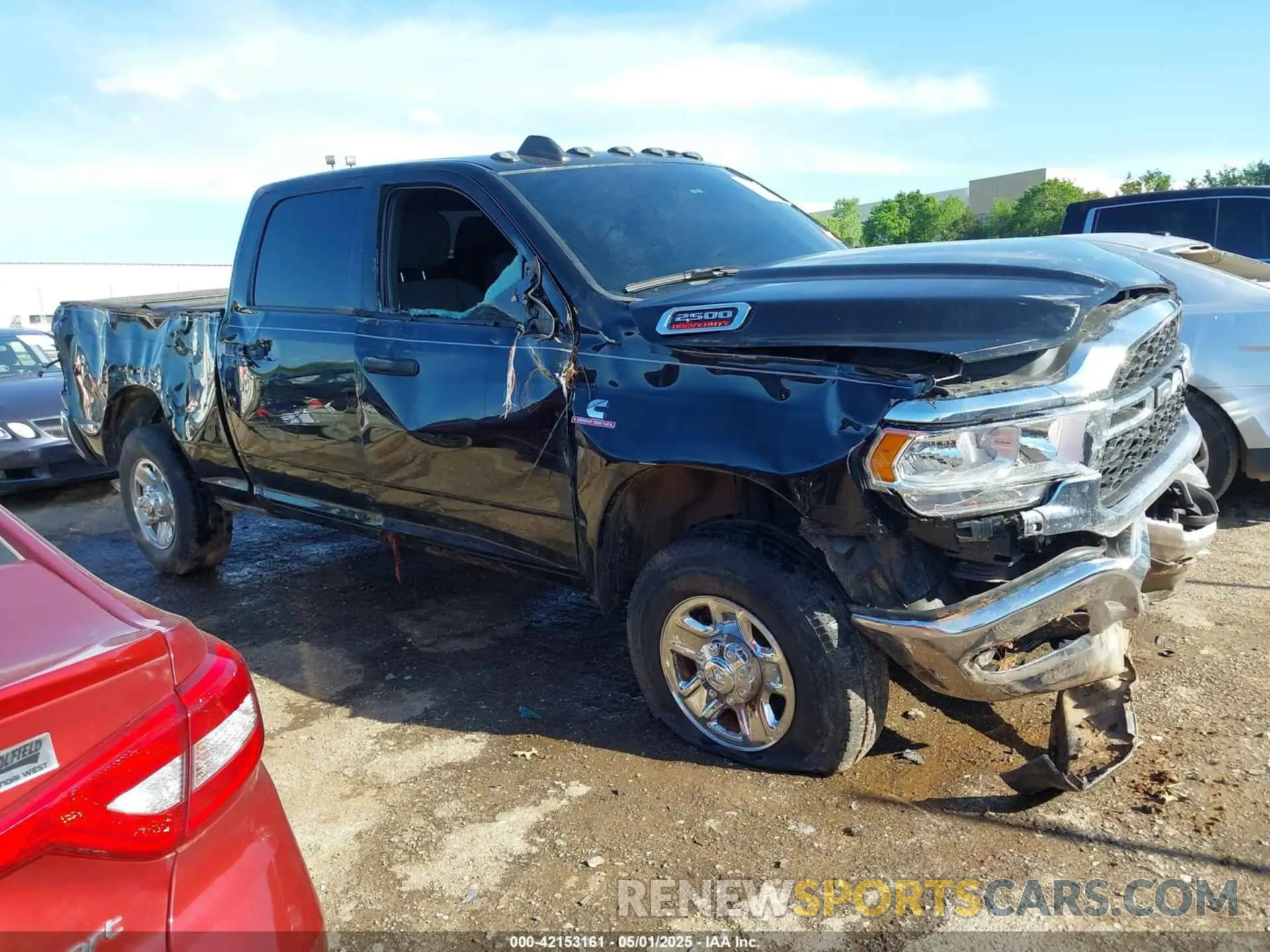 14 Photograph of a damaged car 3C6UR5CL3RG221120 RAM 2500 2024