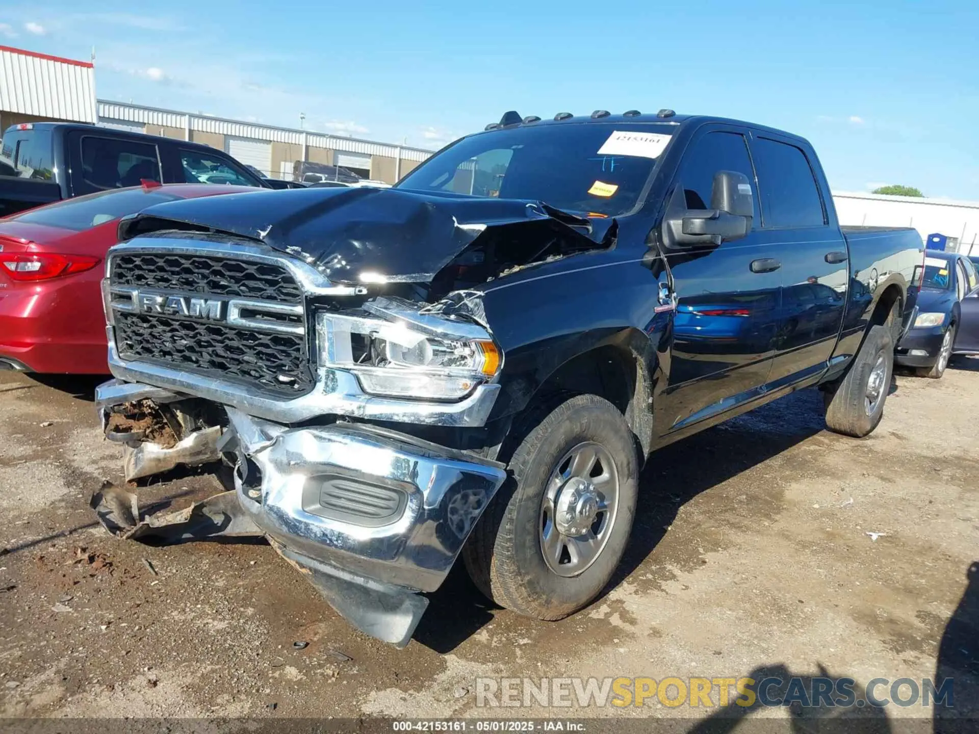 2 Photograph of a damaged car 3C6UR5CL3RG221120 RAM 2500 2024