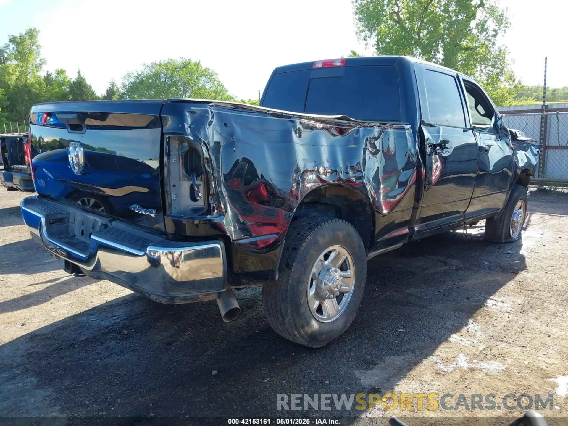 4 Photograph of a damaged car 3C6UR5CL3RG221120 RAM 2500 2024