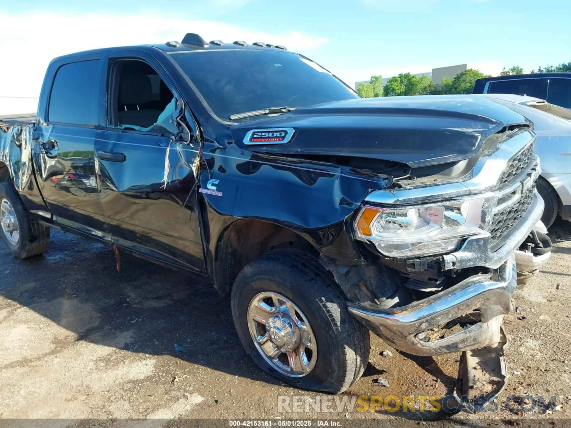 6 Photograph of a damaged car 3C6UR5CL3RG221120 RAM 2500 2024