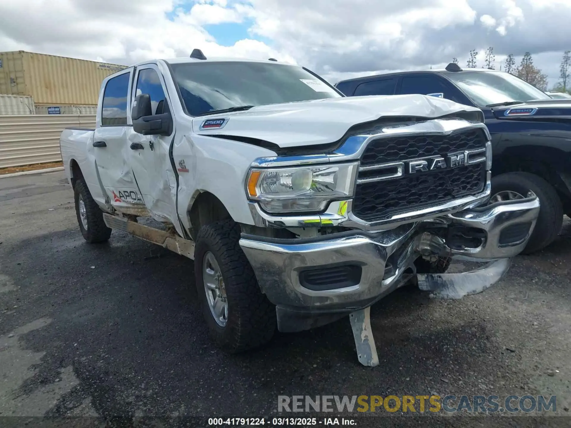 1 Photograph of a damaged car 3C6UR5CL3RG226527 RAM 2500 2024