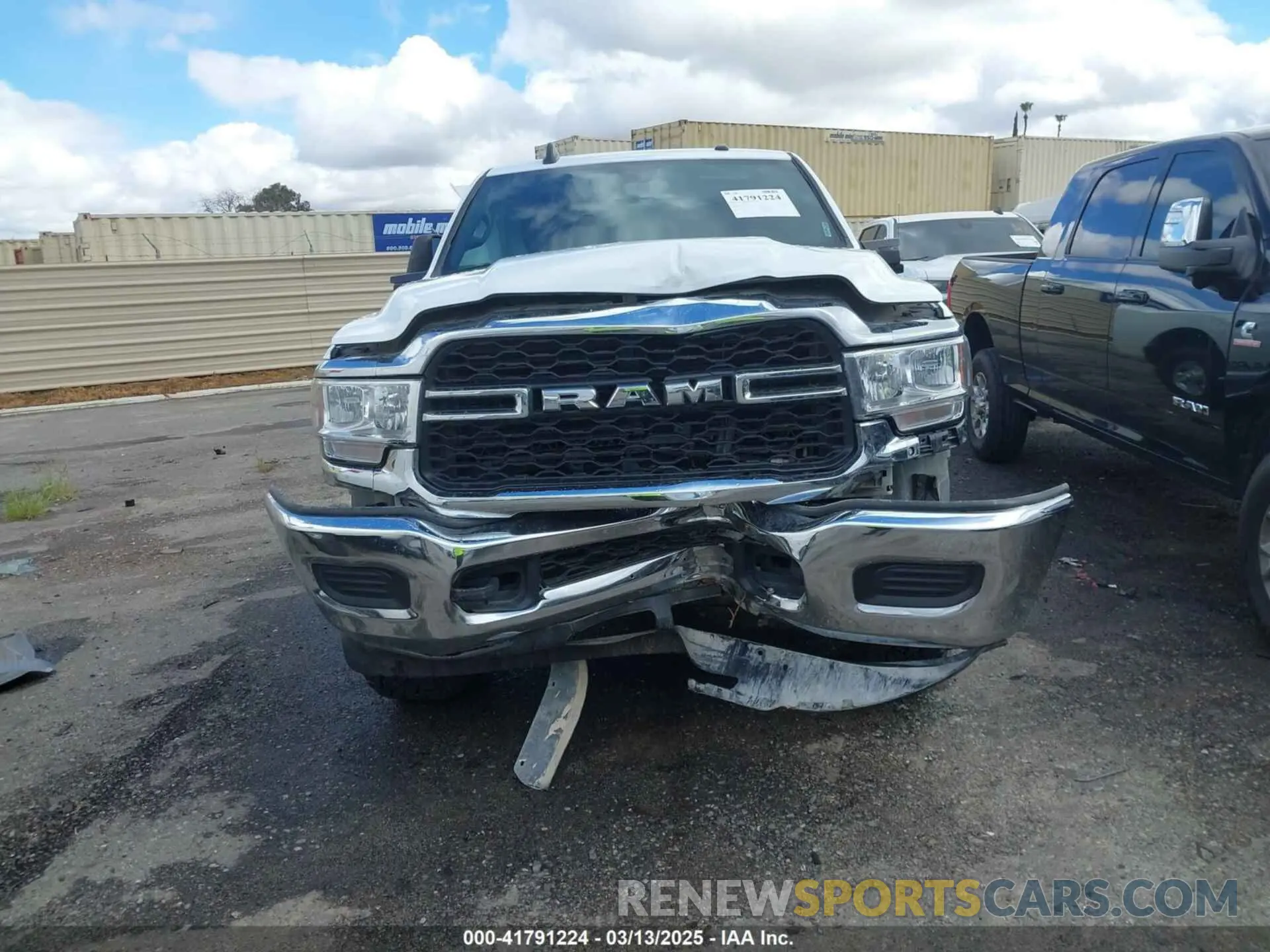 12 Photograph of a damaged car 3C6UR5CL3RG226527 RAM 2500 2024