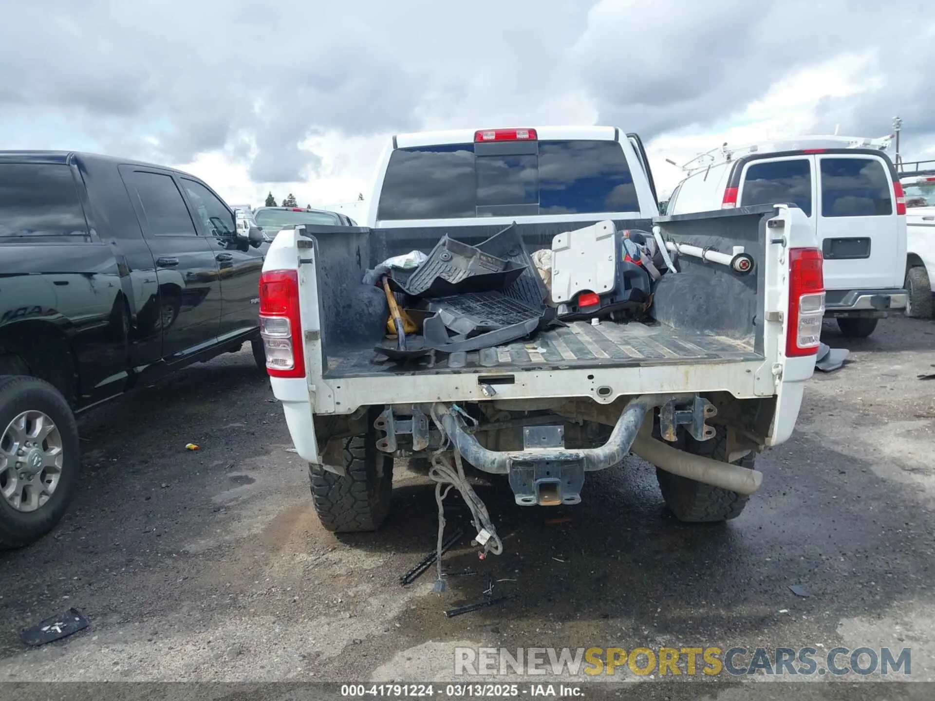 16 Photograph of a damaged car 3C6UR5CL3RG226527 RAM 2500 2024
