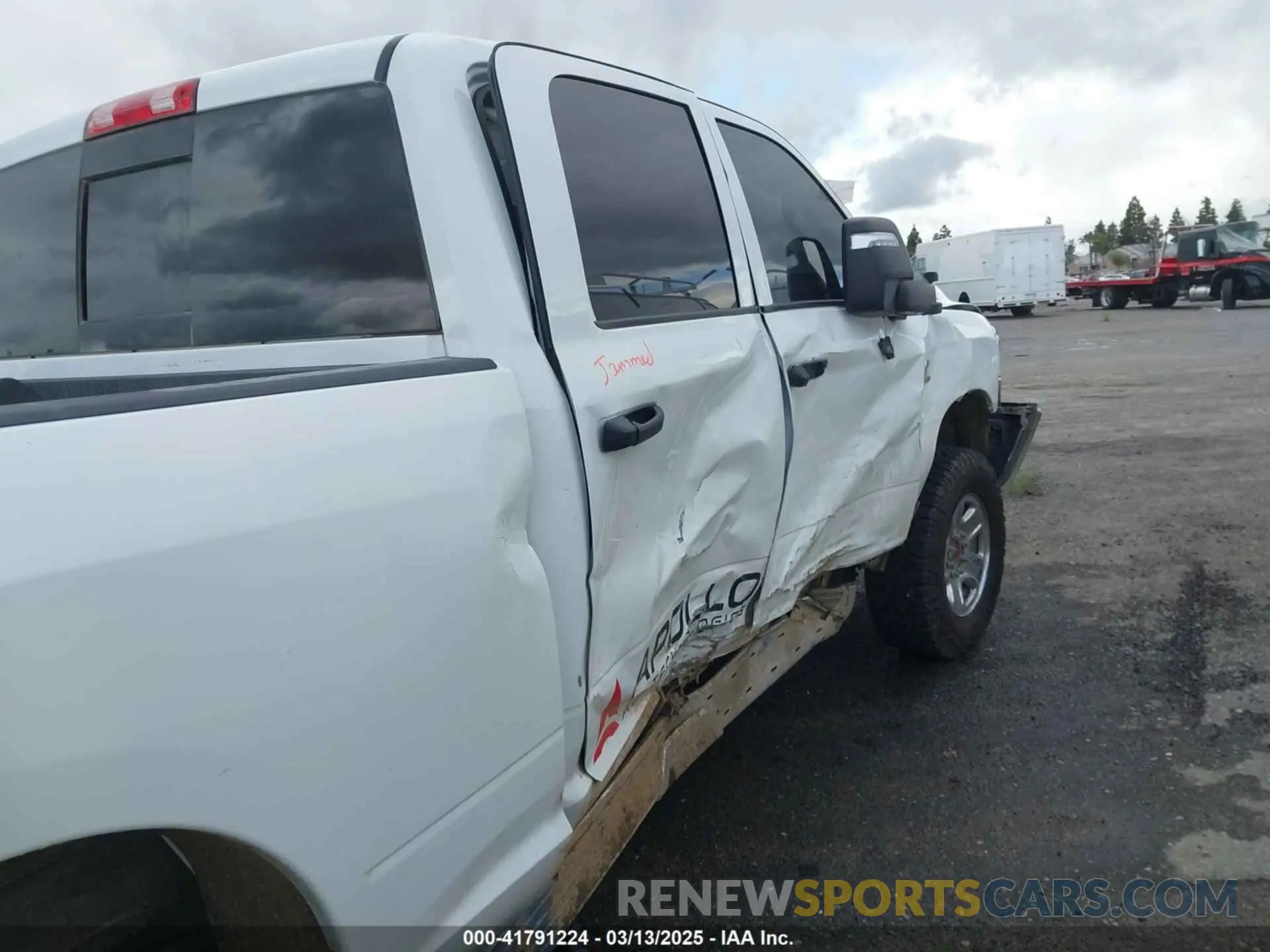 21 Photograph of a damaged car 3C6UR5CL3RG226527 RAM 2500 2024