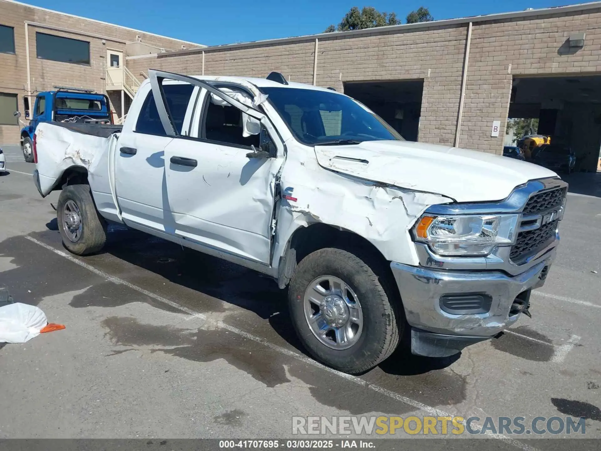 1 Photograph of a damaged car 3C6UR5CL4RG223796 RAM 2500 2024
