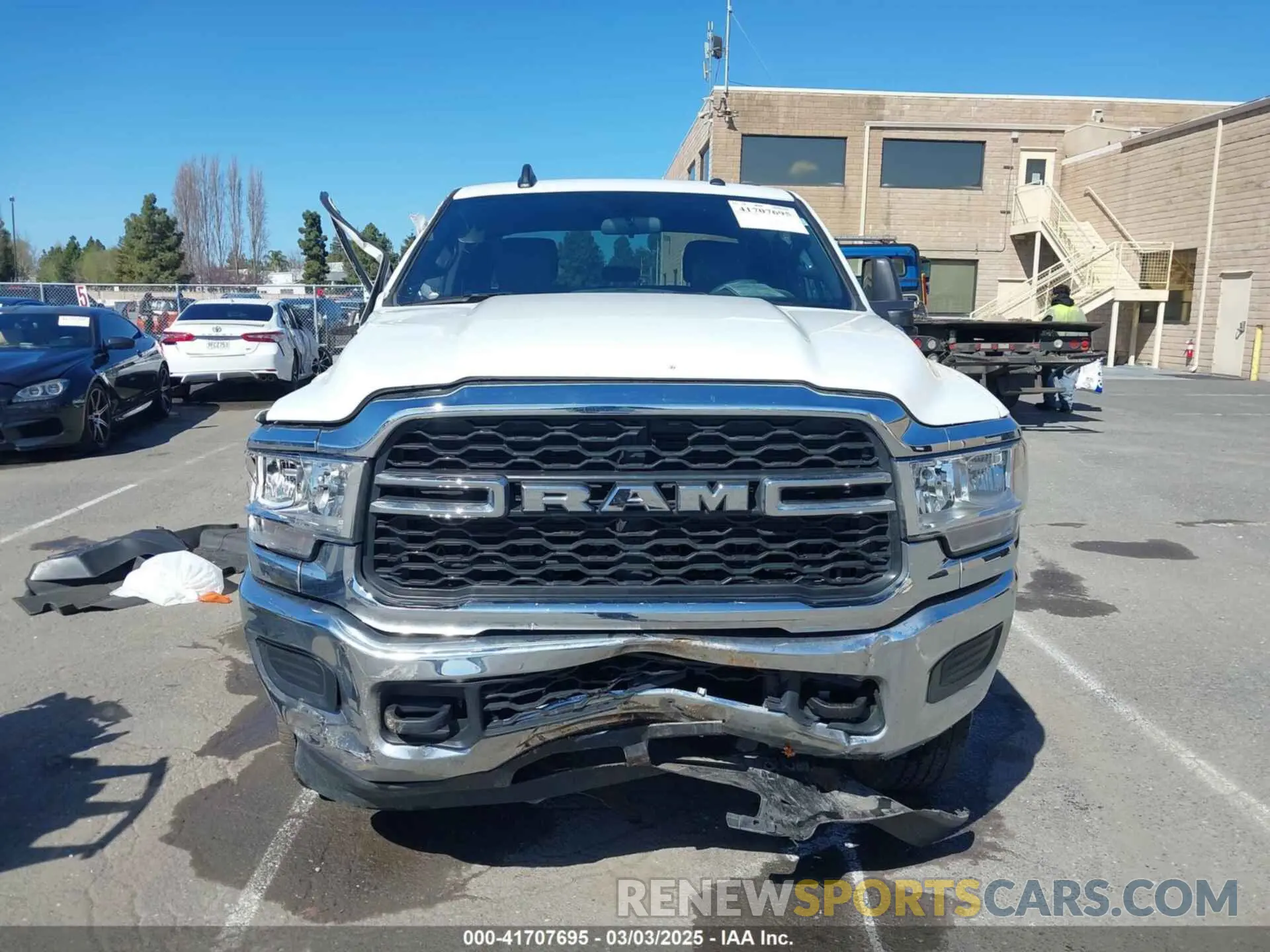12 Photograph of a damaged car 3C6UR5CL4RG223796 RAM 2500 2024