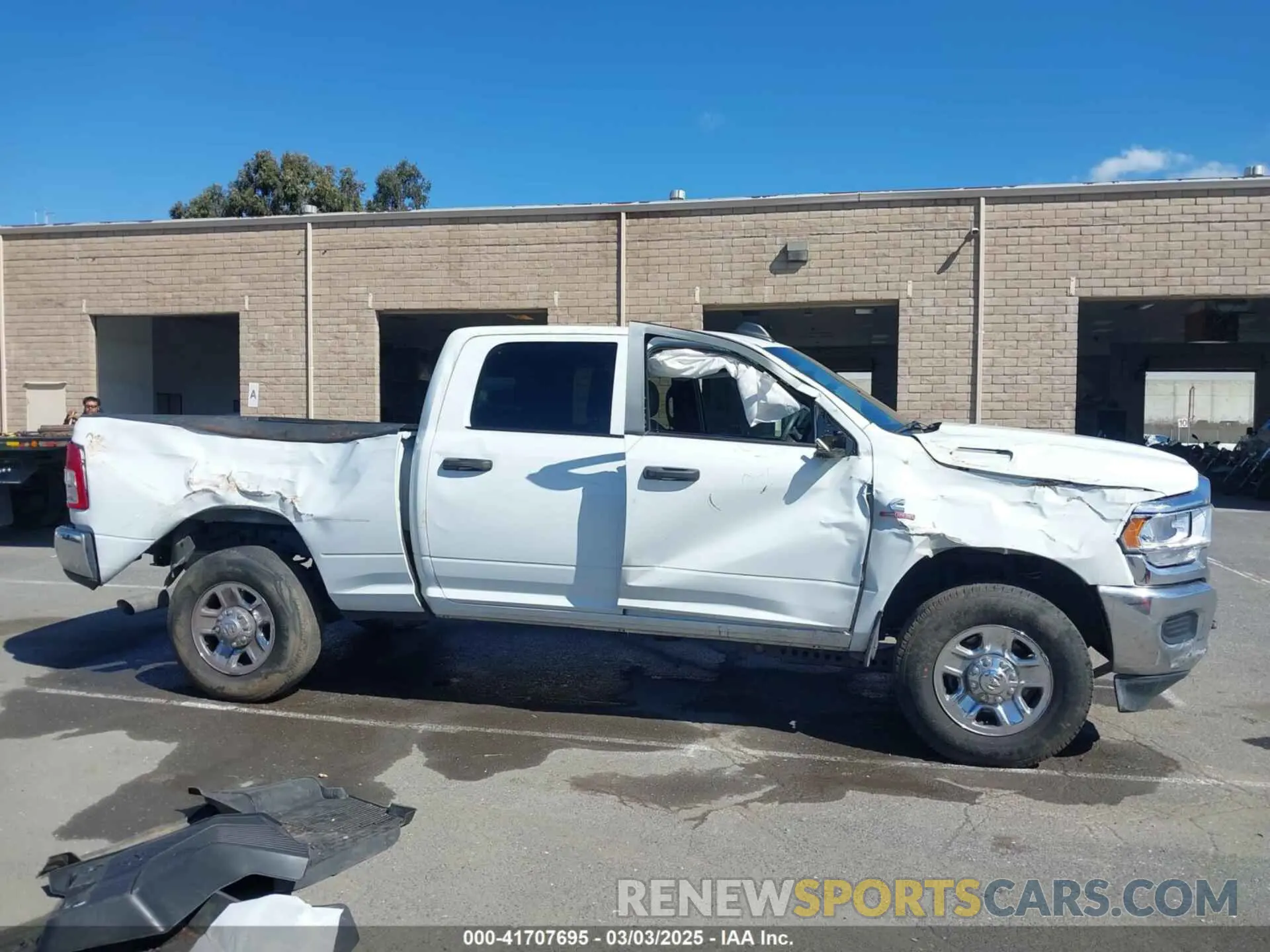 13 Photograph of a damaged car 3C6UR5CL4RG223796 RAM 2500 2024