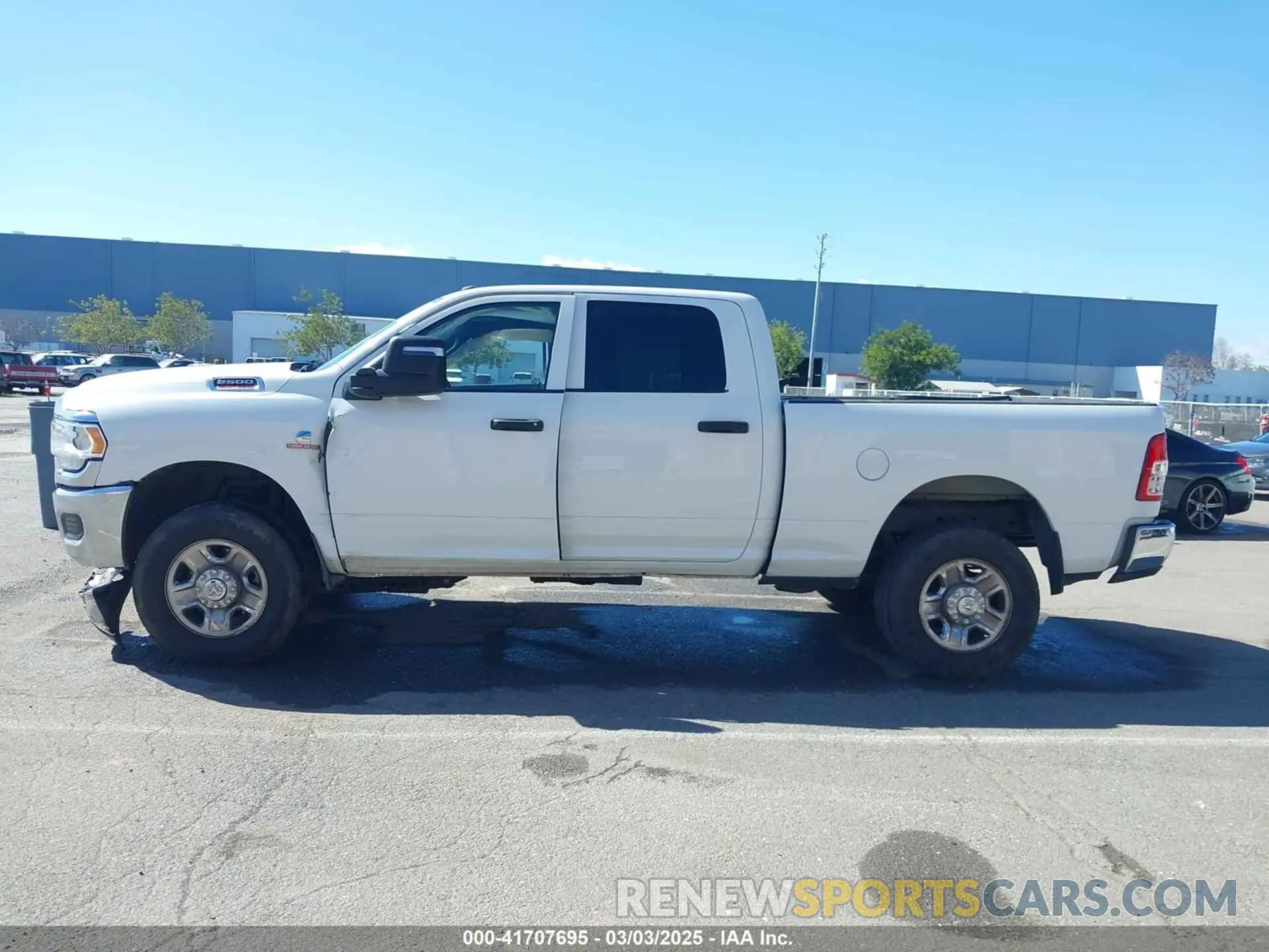 14 Photograph of a damaged car 3C6UR5CL4RG223796 RAM 2500 2024