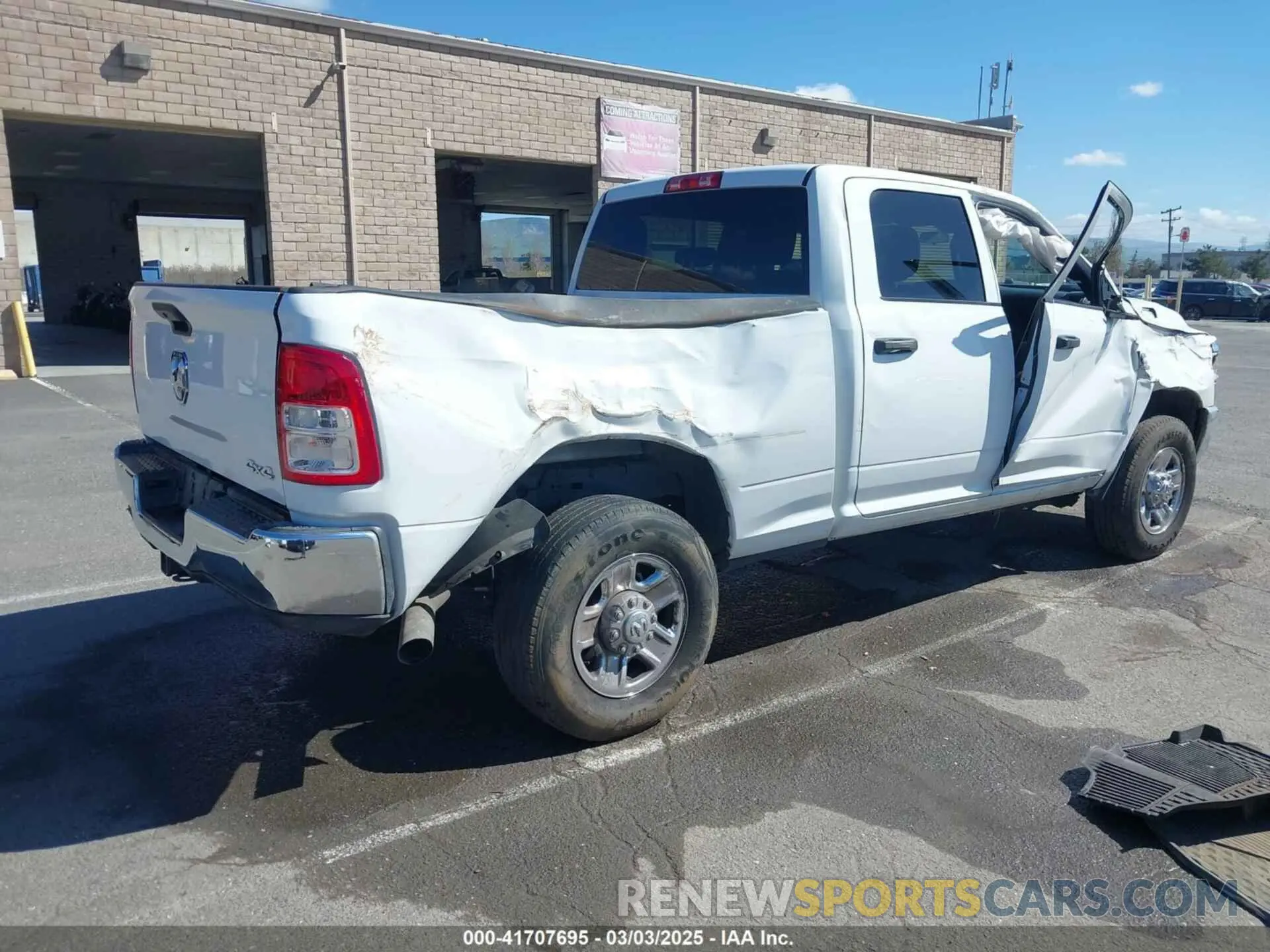 4 Photograph of a damaged car 3C6UR5CL4RG223796 RAM 2500 2024