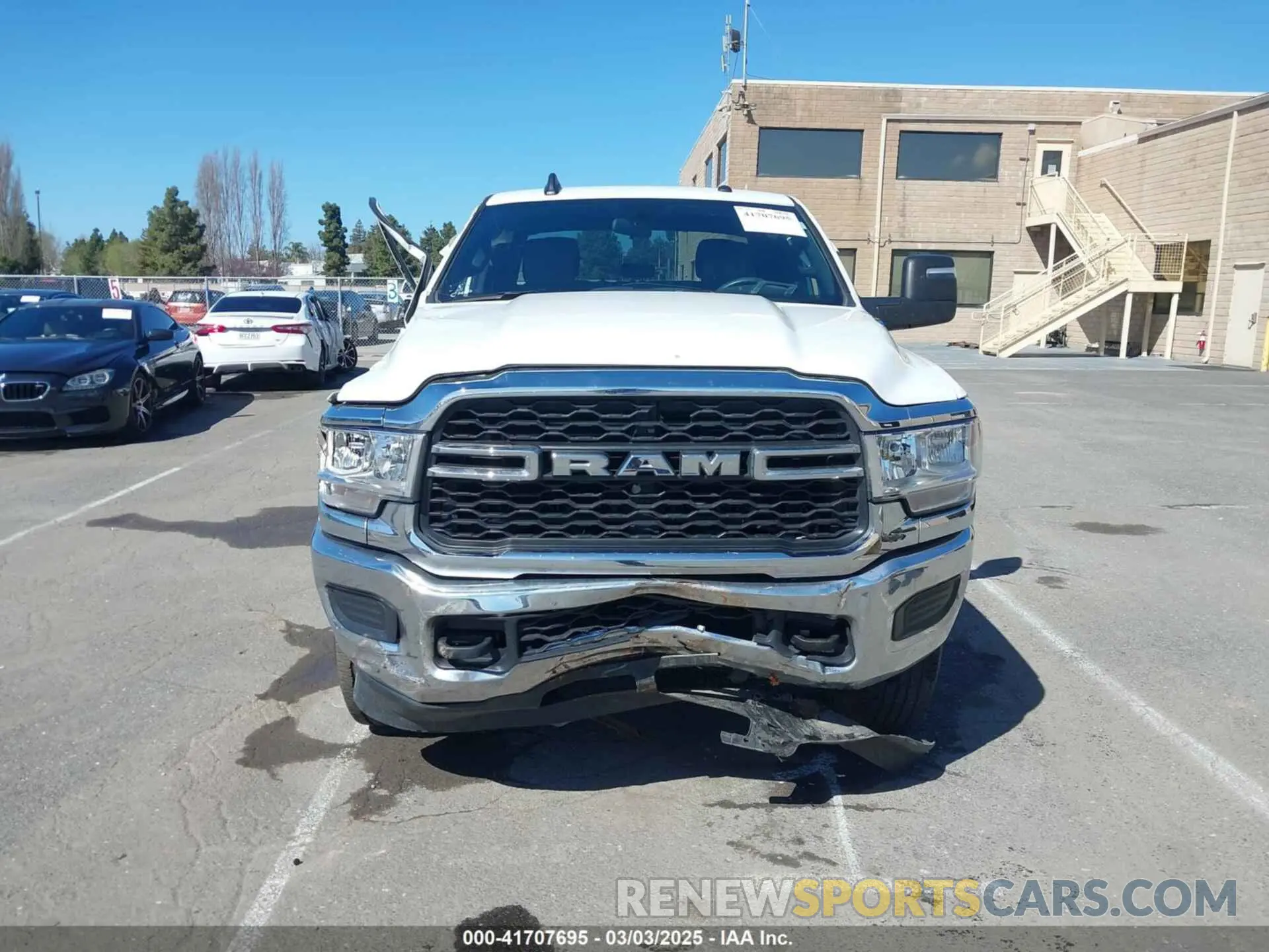 6 Photograph of a damaged car 3C6UR5CL4RG223796 RAM 2500 2024