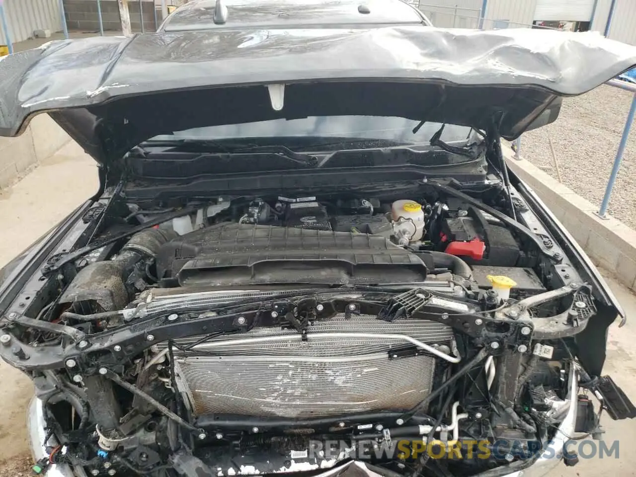 11 Photograph of a damaged car 3C6UR5CL4RG356686 RAM 2500 2024