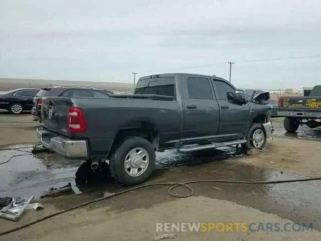 13 Photograph of a damaged car 3C6UR5CL4RG356686 RAM 2500 2024